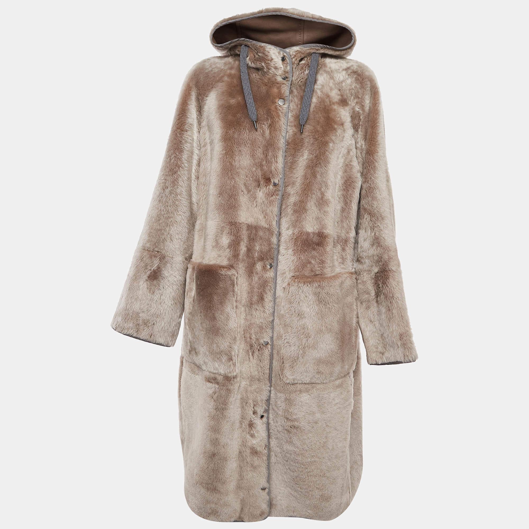 Wrap yourself in warmth and style with this Brunello Cucinelli coat. Meticulously crafted for comfort and fashion it epitomizes timeless sophistication. Each stitch reflects quality making it an essential piece for every wardrobe.