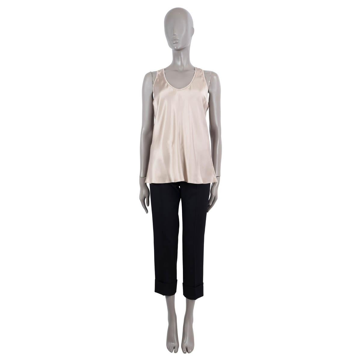 100% authentic Brunello Cucinelli monili trim tank-top in taupe silk satin (100%). Features a loose fit silhouette and are rib-knit trim in cotton (94%) and lycra (4%) along the scoop neckline. Unlined. Has been worn and is in excellent