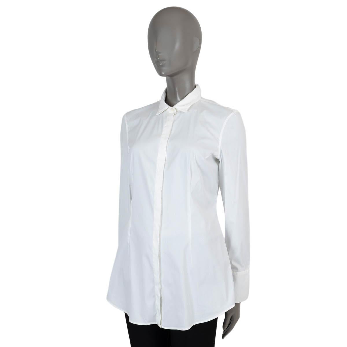 100% authentic Brunello Cucinelli poplin button-up shirt in white cotton (72%), polyamide (23%) and elastane (5%). Features a double layered collar. Closes with concealed buttons down the front. Has been worn and is in excellent condition.