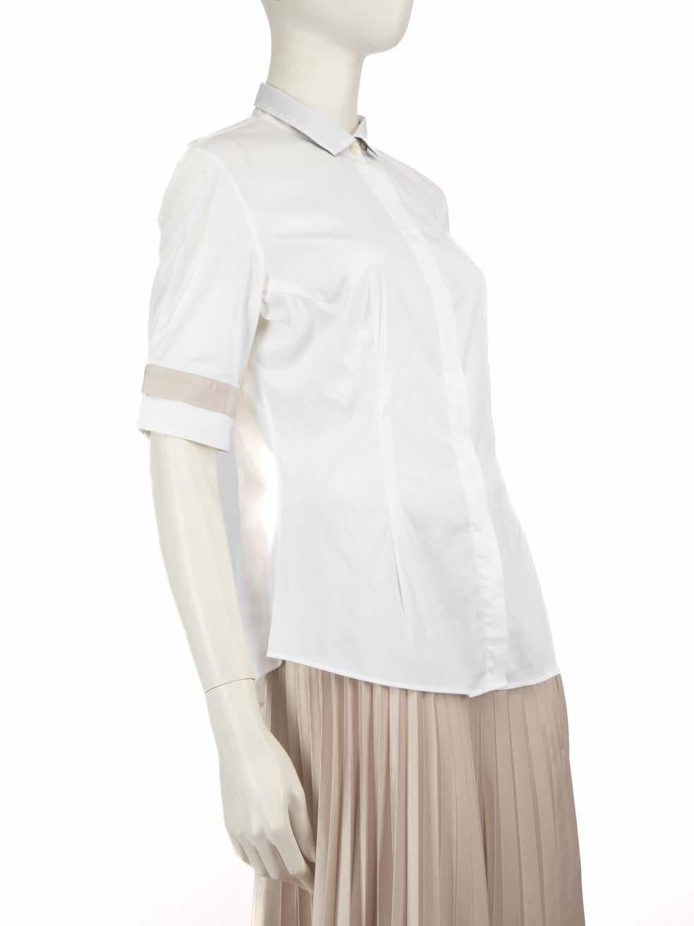 CONDITION is Very good. Hardly any visible wear to shirt is evident. Due to poor storage there are two small marks on the front of this shirt on this used Brunello Cucinelli designer resale item.
  
  
  
  Details
  
  
  White
  
  Cotton
  
 