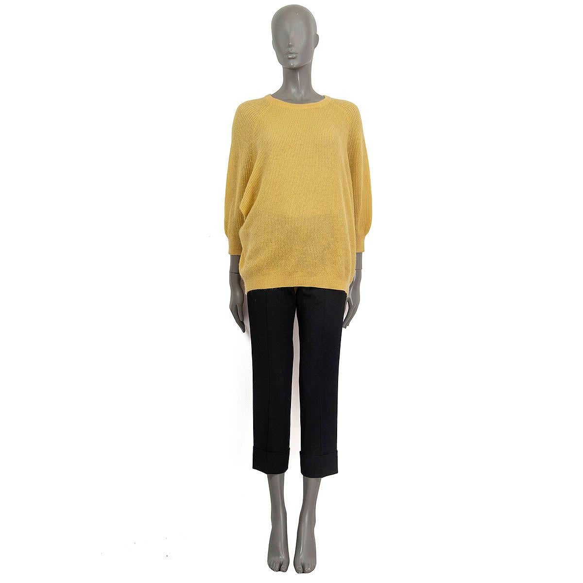 100% authentic Brunello Cucinelli knit sweater in yellow polyamide (47%), mohair (37%) and wool (16%). Features 3/4 raglan sleeves. Unlined. Has been worn and is in excellent condition. 

Measurements
Tag Size	M
Size	M
Bust	77cm (30in) to 180cm