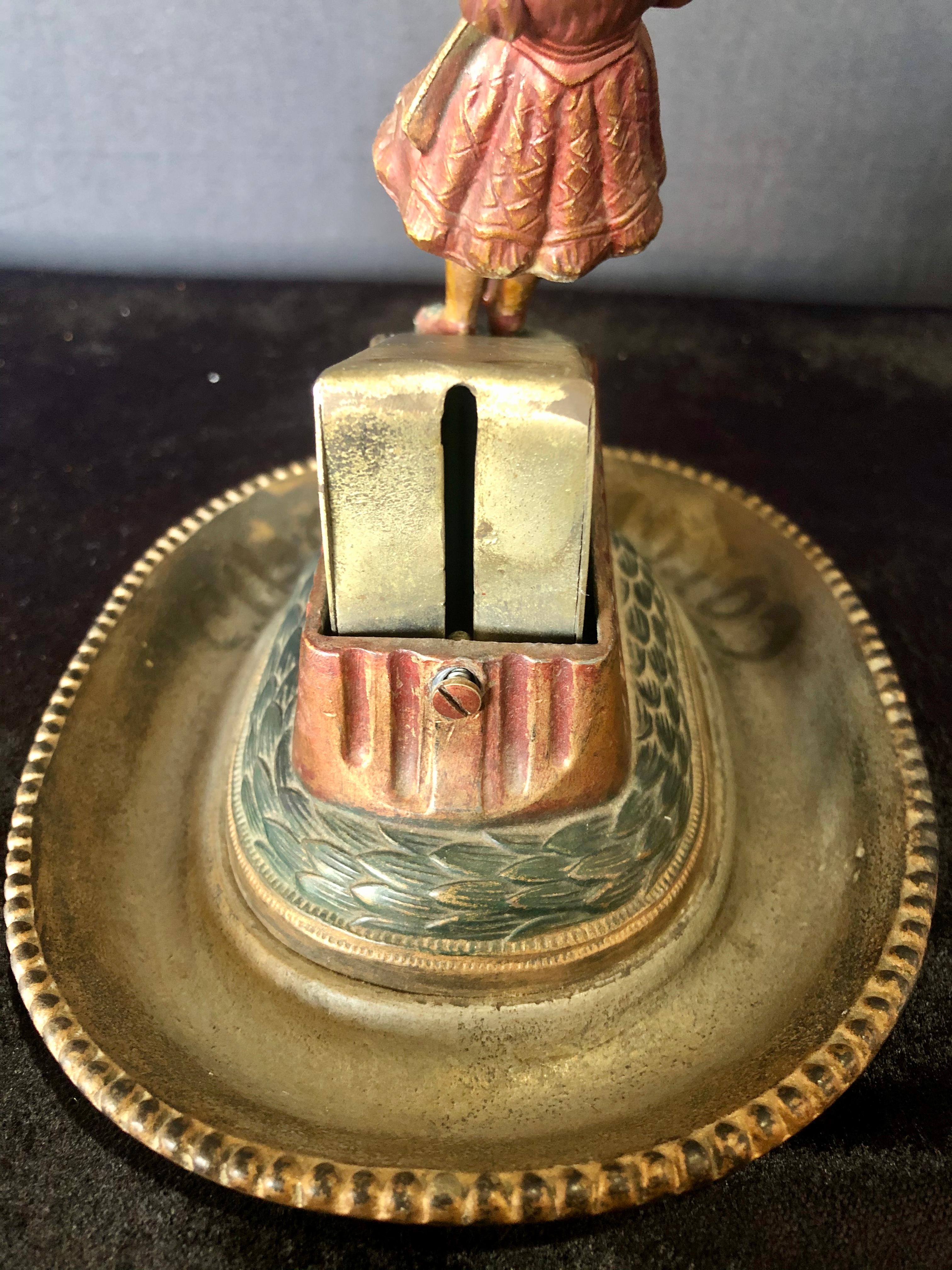 20th Century Brunhoff Mfg. Co. Antique Cigar Cutter with Leaning Lady Tobacco Accessory