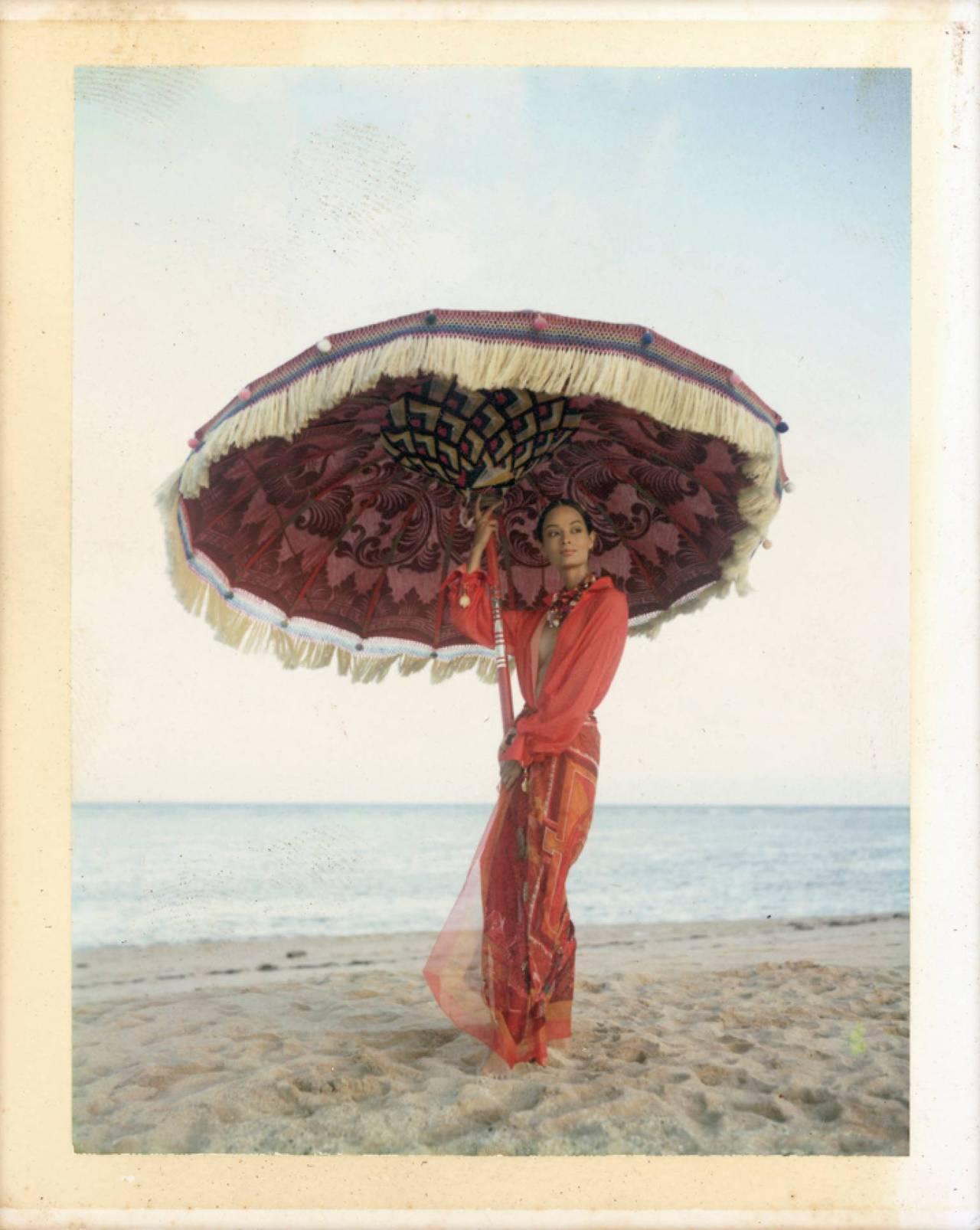 Bruno Bisang Figurative Photograph - 'Leticia H., Bali' - in red under a red parasol, fine art photography, 1993