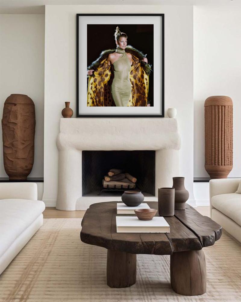 Linda Evangelista in a Green Dress and Fur Coat on the Versace Runway, Photographed by Bruno Bisang at the Versace fashion show, Ready-to-wear Autumn-Winter 1996/97.

All prints are limited edition. Available in multiple sizes. High-end framing on