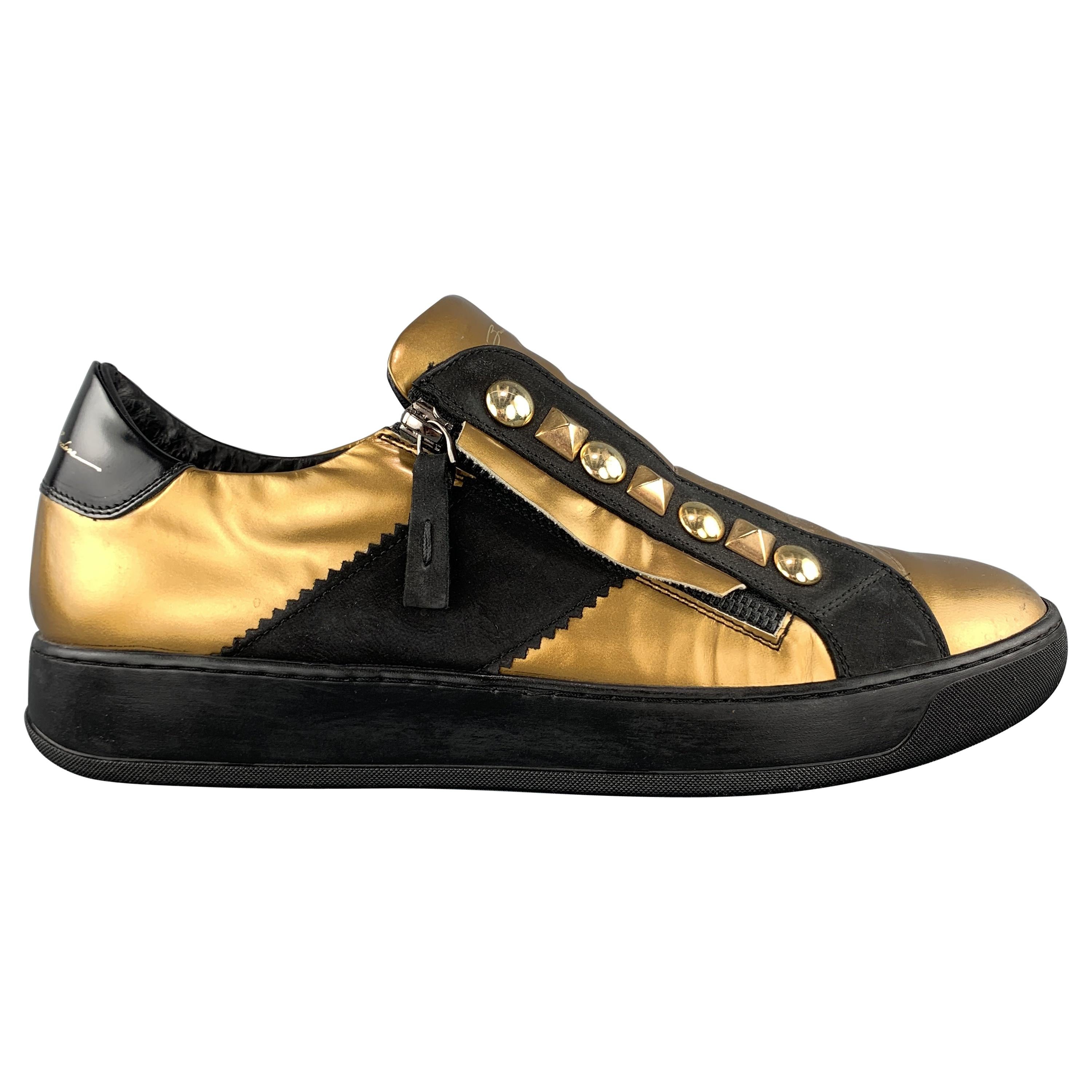 gold studded trainers