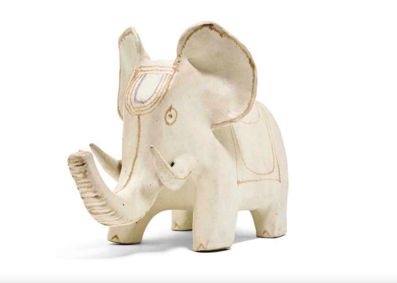 Elephant, 1990s.
Sandstone with a light grey and brown glaze. The bottom signed: Gambone Italy.
Measures: H 19 cm x L 31 cm x L 14.5 cm.

About the artist:
Bruno Gambone (born in 1936) is an Italian ceramist and the son of Guido Gambone, one of