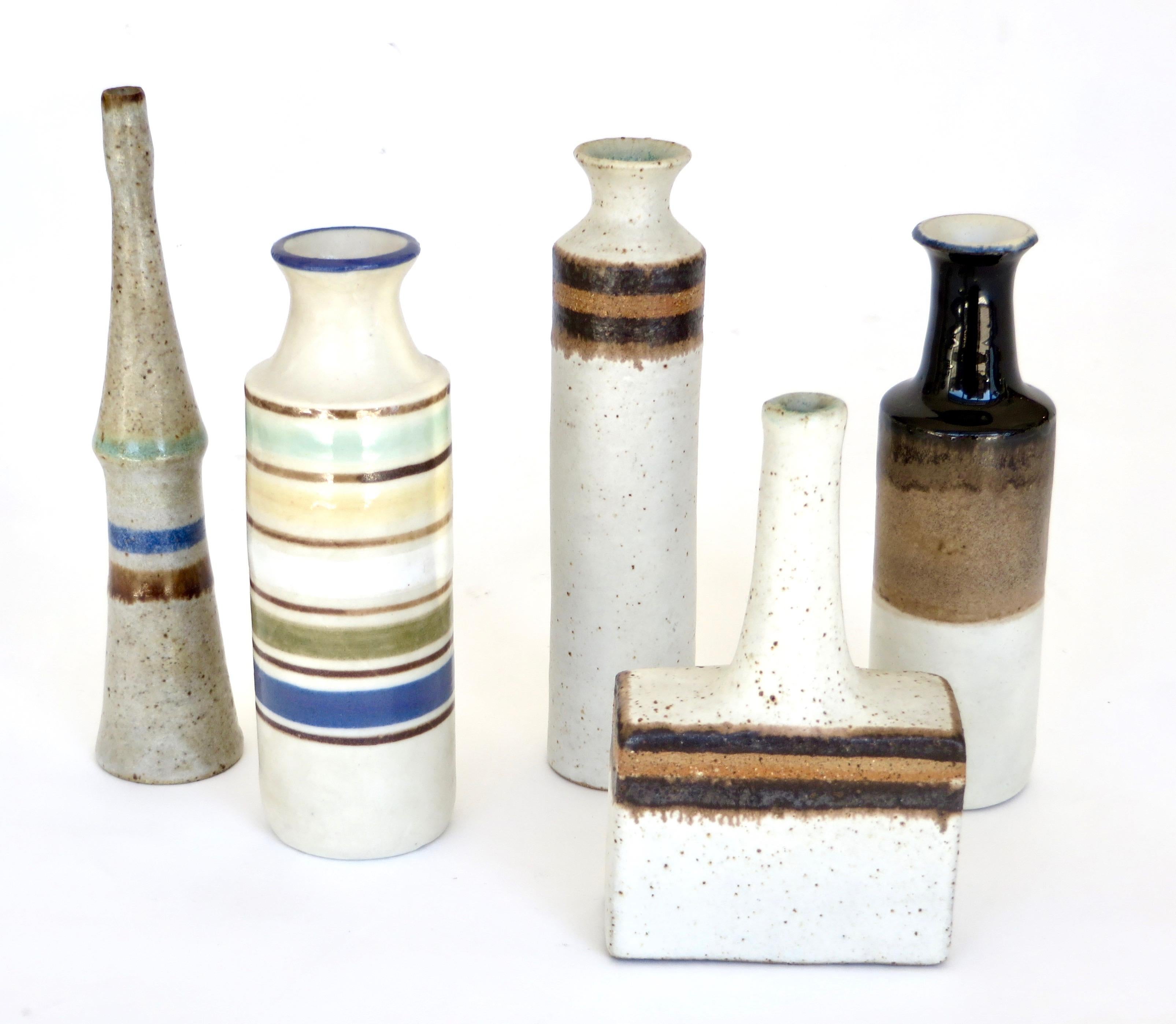 A collection of Italian ceramic artist Bruno Gambone miniature ceramic bottles.
Tallest: 7