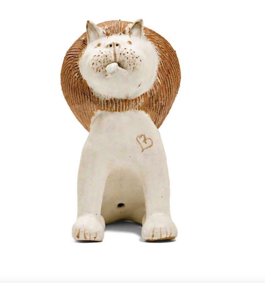 Funny seated lion, 1990s.
Sandstone with a light grey and brown glaze. The bottom signed: Gambone Italy.
Measures: 18 x 21 x 29 cm.

About the artist:
Bruno Gambone (born in 1936) is an Italian ceramist and the son of Guido Gambone, one of