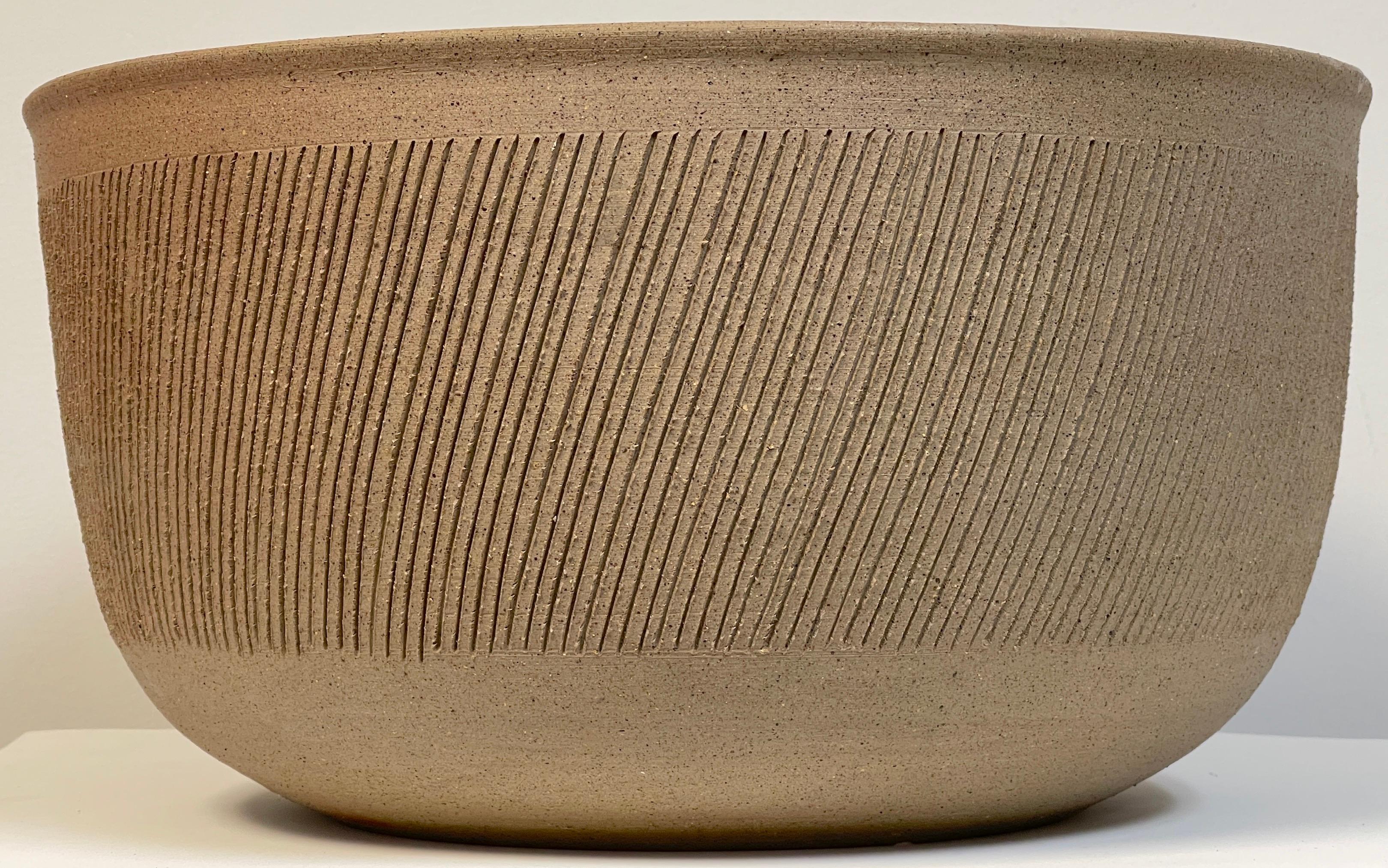 Bruno Gambone large incised pottery centerbowl, circa 1970s
Bruno Gambone is an Italian ceramicist and painter, born in 1936. The son of Guido Gambone, (1909-1969) the renowned ceramic artists of the 20th century, 
After Guido Gambone,'s death in