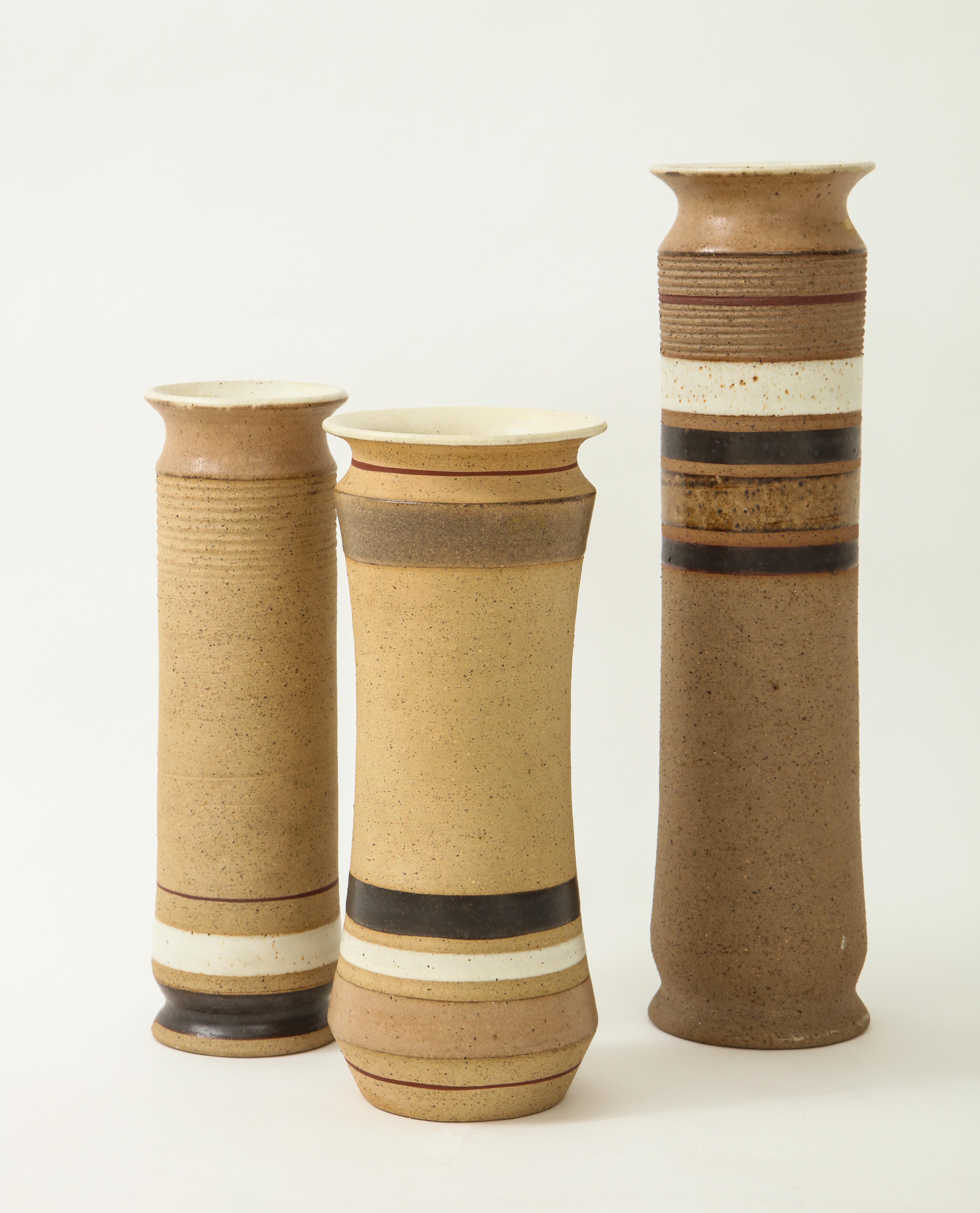 Set of 3 ceramic vases signed on underside 'GAMBONE ITALY'.