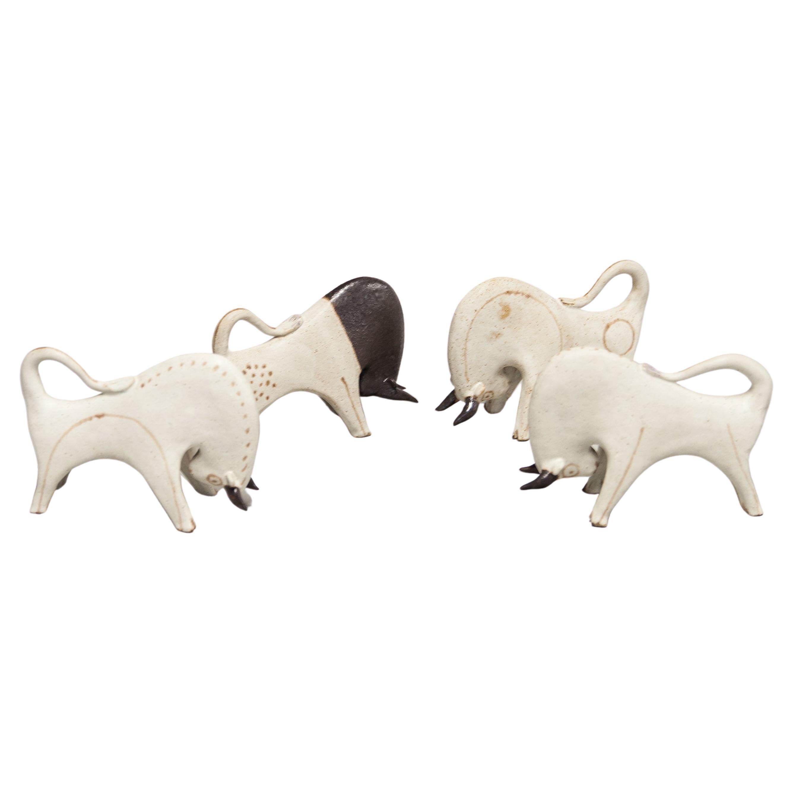 Bruno Gambone Stoneware Bull Set of 4 For Sale