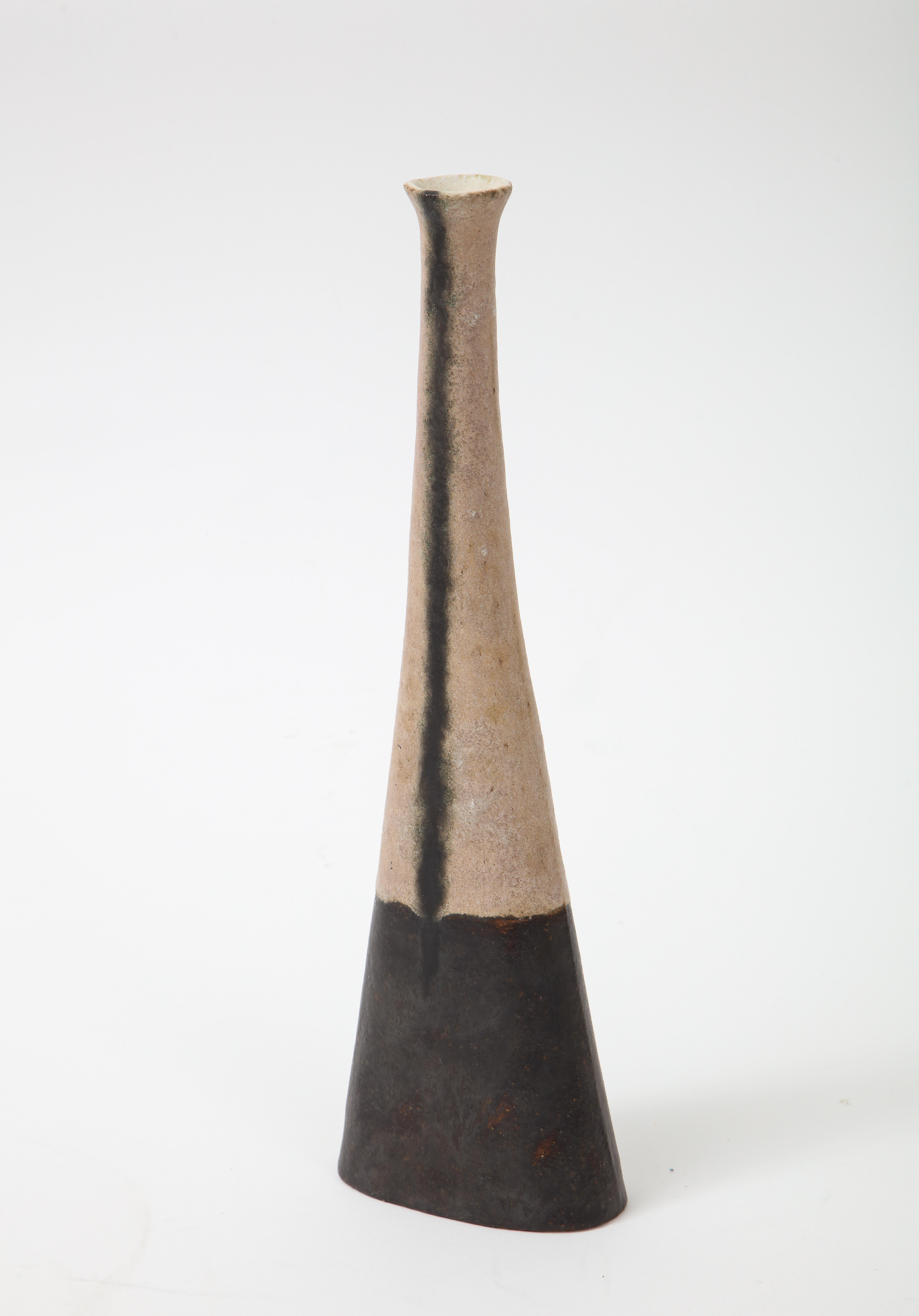 Bruno Gambone stoneware or ceramic vase or vessel in matte tan with dark brown line and base, Italy, 1970s. Marked with glazed signature to underside 