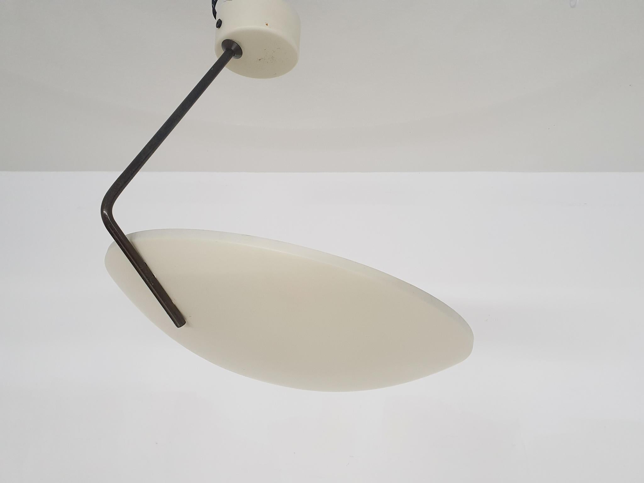 Off white metal wall or ceiling light by Bruno Gatta for Stilnovo, model 232.
In the book 