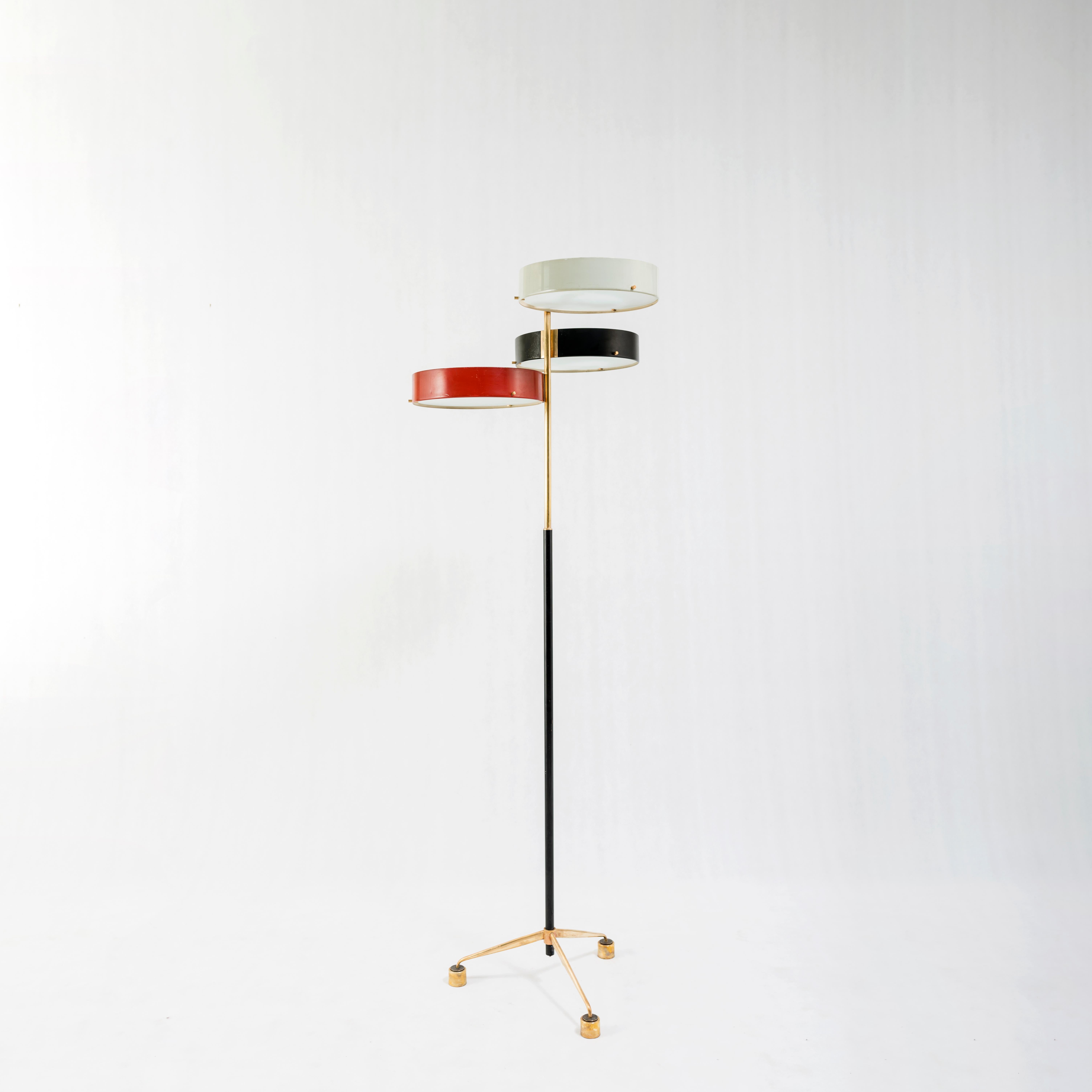 The Bruno Gatta floor lamp stands as a rare and unique piece within the realm of mid-20th century lighting design, showcasing the innovative spirit and artistic vision of its creator. Crafted with meticulous attention to detail and imbued with a