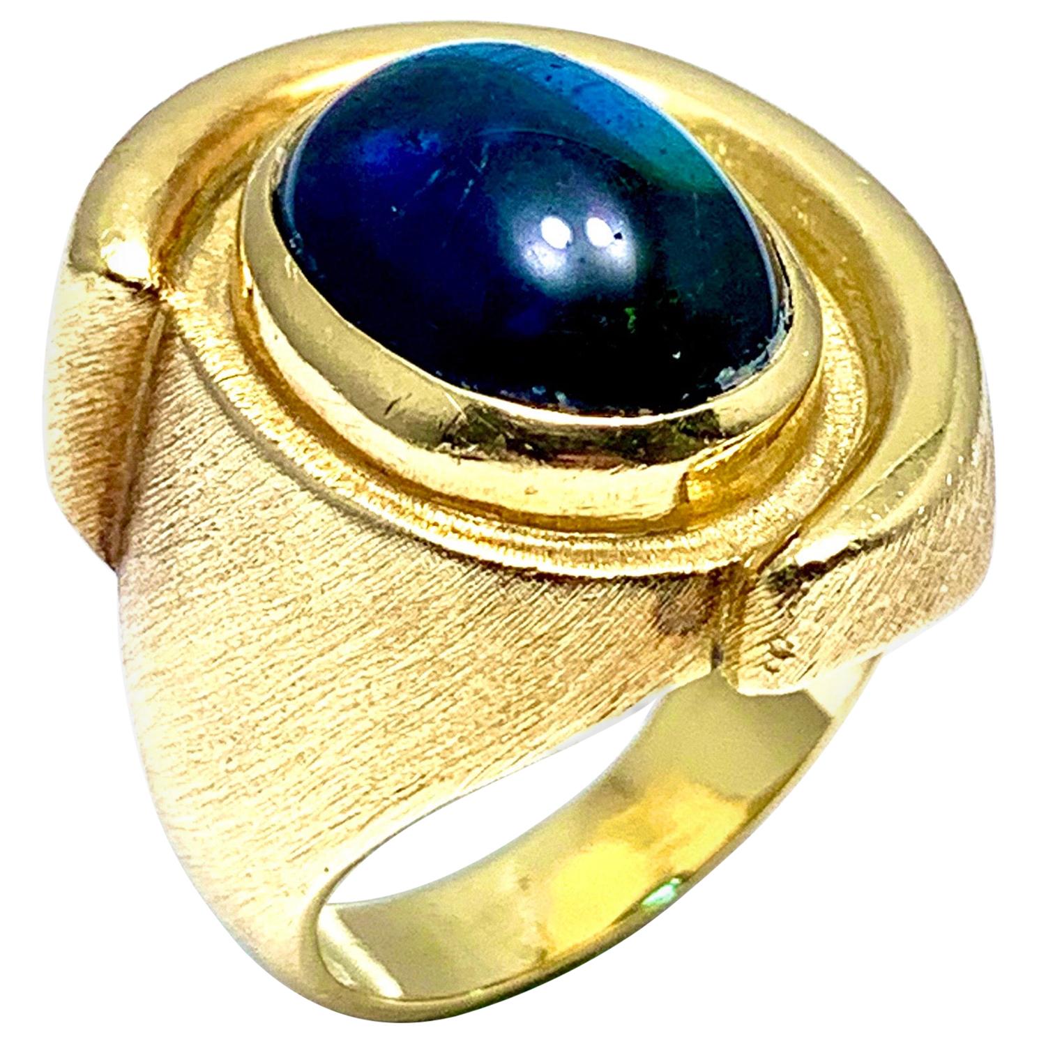 Bruno Guidi 6.43 Carat Cabochon Indicolite Tourmaline 18 Karat Yellow Gold Ring For Sale