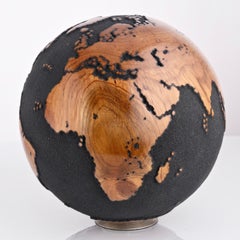 Used Midnight Journey Black Teak Globe by Bruno Helgen - wood globe sculpture 