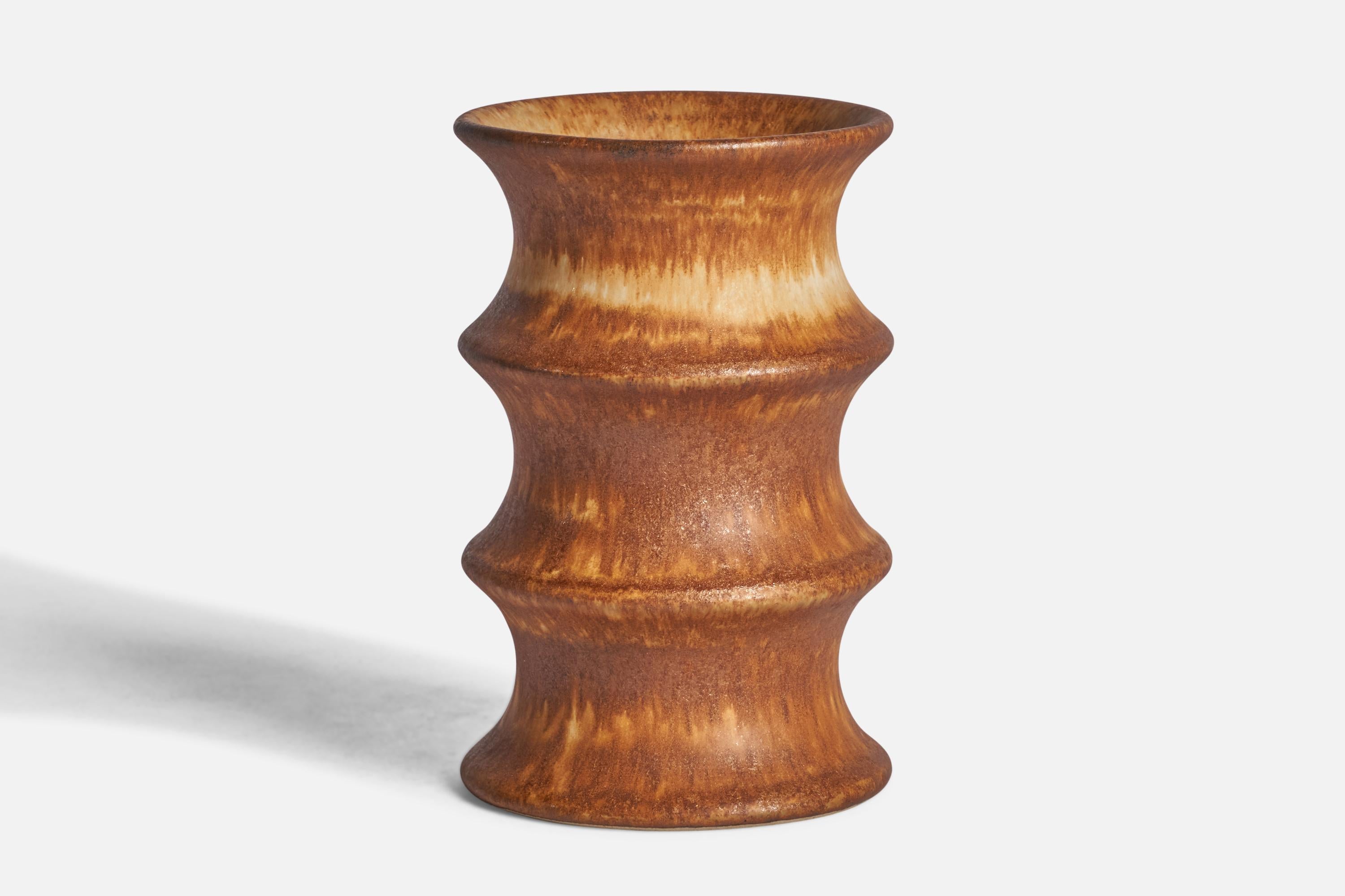 A brown-glazed stoneware vase designed by Bruno Karlsson and produced by Ego Stengods, Sweden, c. 1960s.

“EGO STENGODS ATELJE” on bottom