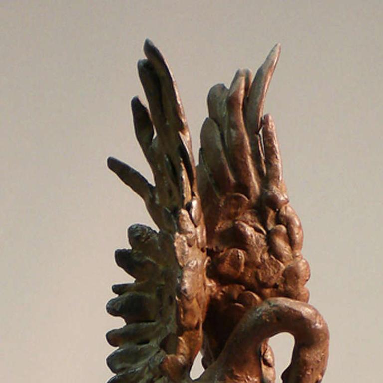 Sculpture of pelican with wings up