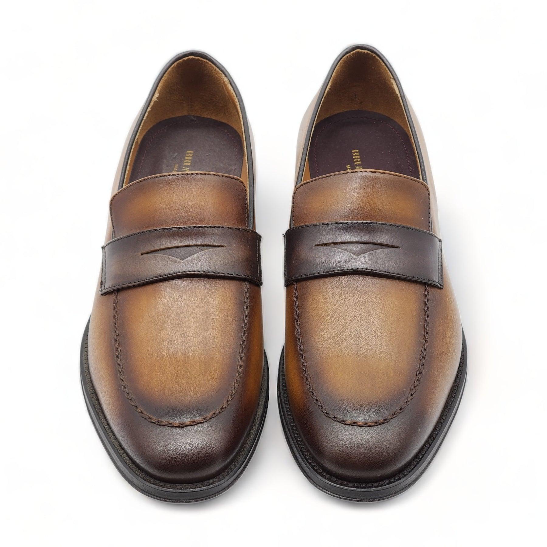 Bruno Magli Arezzo Burnished Leather Penny Loafer in Brown

Additional information:
Material: Leather
Color: Brown
Collection: Summer 2024
Size: 13 US
Country: Italy