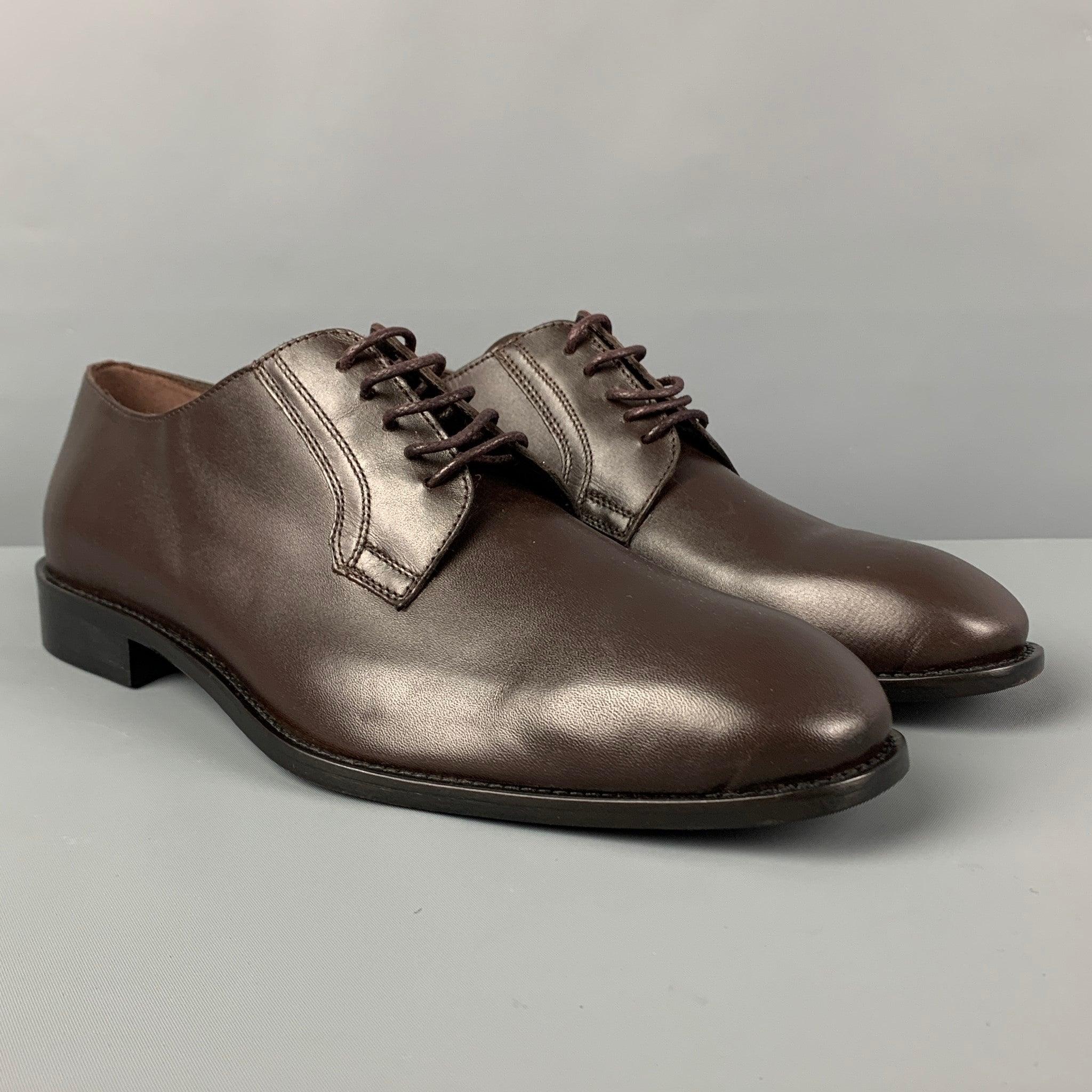 BRUNO MAGLI shoes comes in a dark brown leather featuring a classic style anda lace up closure. Includes box. Made in Italy.
Very Good
Pre-Owned Condition. 

Marked:   43Outsole: 12.25 inches  x 4.25 inches 
  
  
 
Reference: 120004
Category: Lace