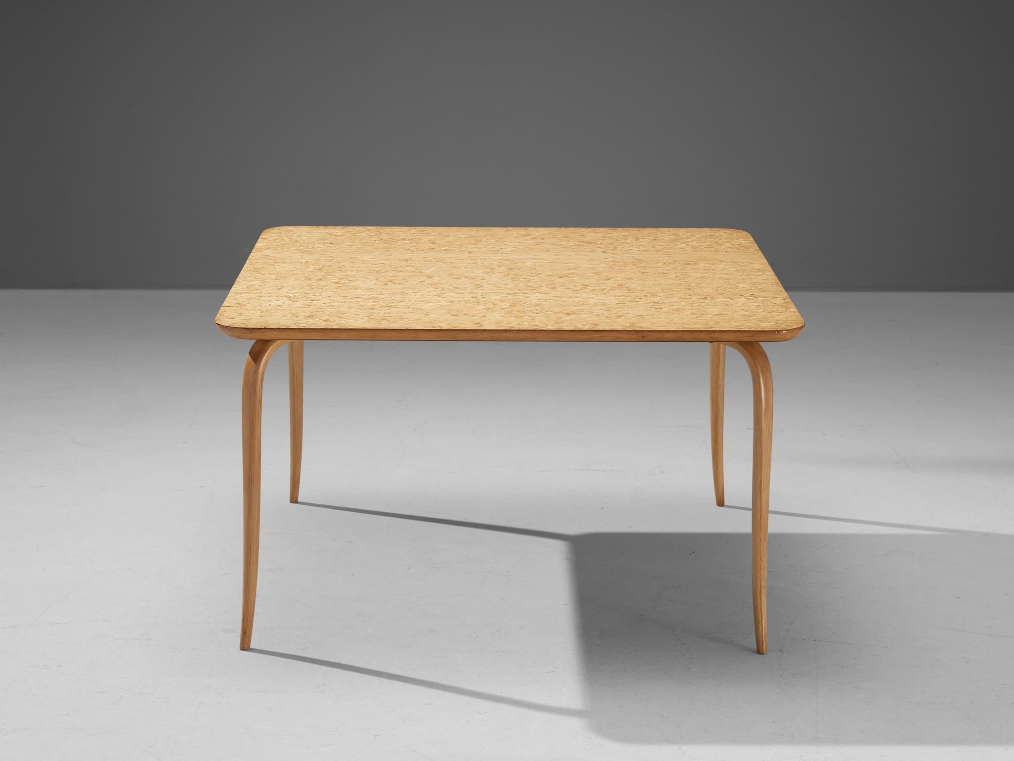 Bruno Mathsson, coffee table model 'Annika', birch, Sweden 1950s.

This so called 'Annika' coffee table has birch plywood legs, which are fluently curved and tapered. These light legs are elegantly built and give this piece its unique appearance.