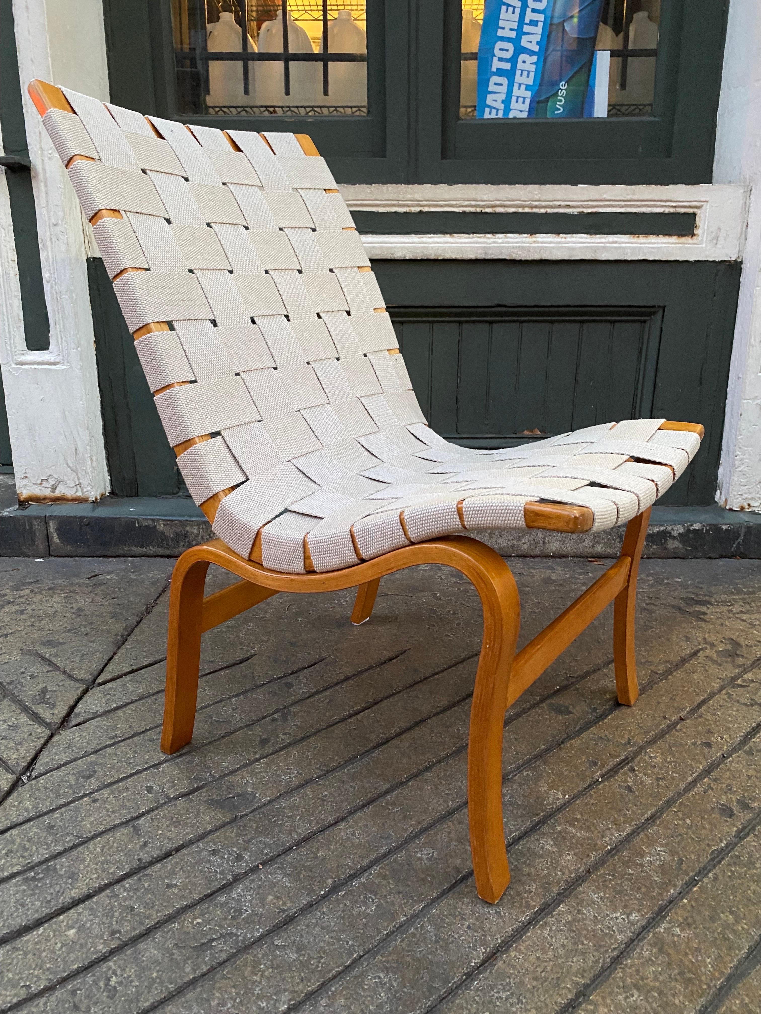 Bruno Mathsson Eva Chair. Newly re-webbed with NOS correct webbing! Beautiful Condition to the wood! Chair is Sturdy and Solid. Graceful Beautiful Design!