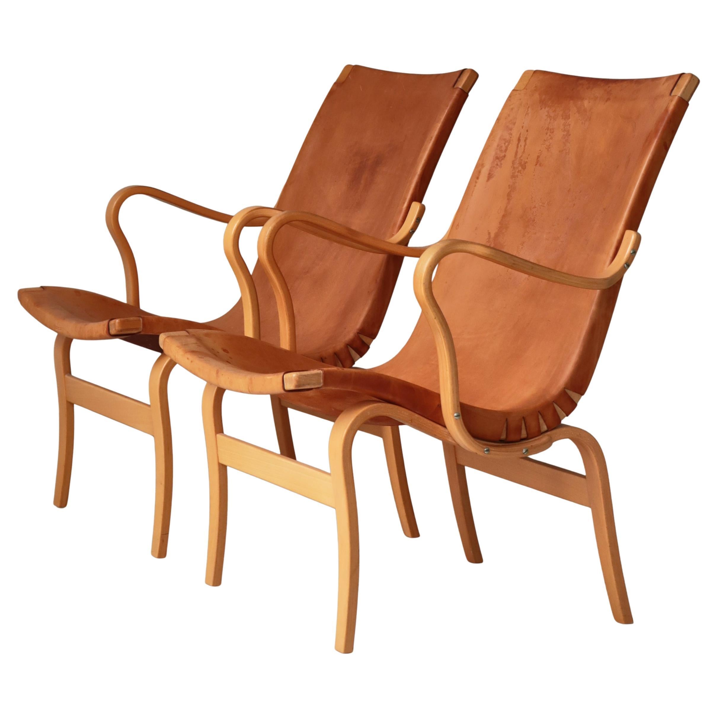 Bruno Mathsson "Eva" Lounge Chairs in Saddle Leather, Scandinavian Modern, 1970s im Angebot