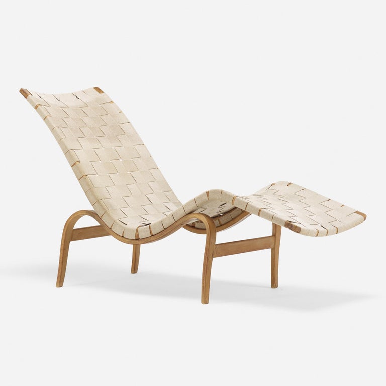 Bruno Mathsson model 36 lounge chair. Made of beech, birch and webbing. Manufacturer decal on underside of chair attests to authenticity. Reads, 