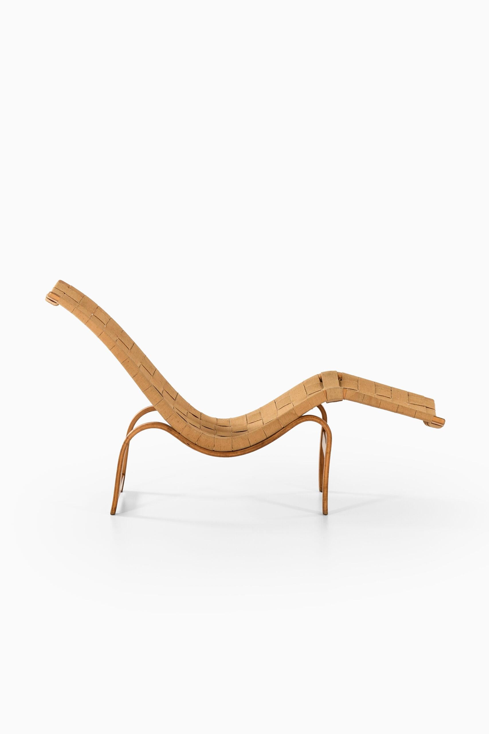 Rare early lounge chair designed by Bruno Mathsson. Produced by Karl Mathsson in Värnamo, Sweden.