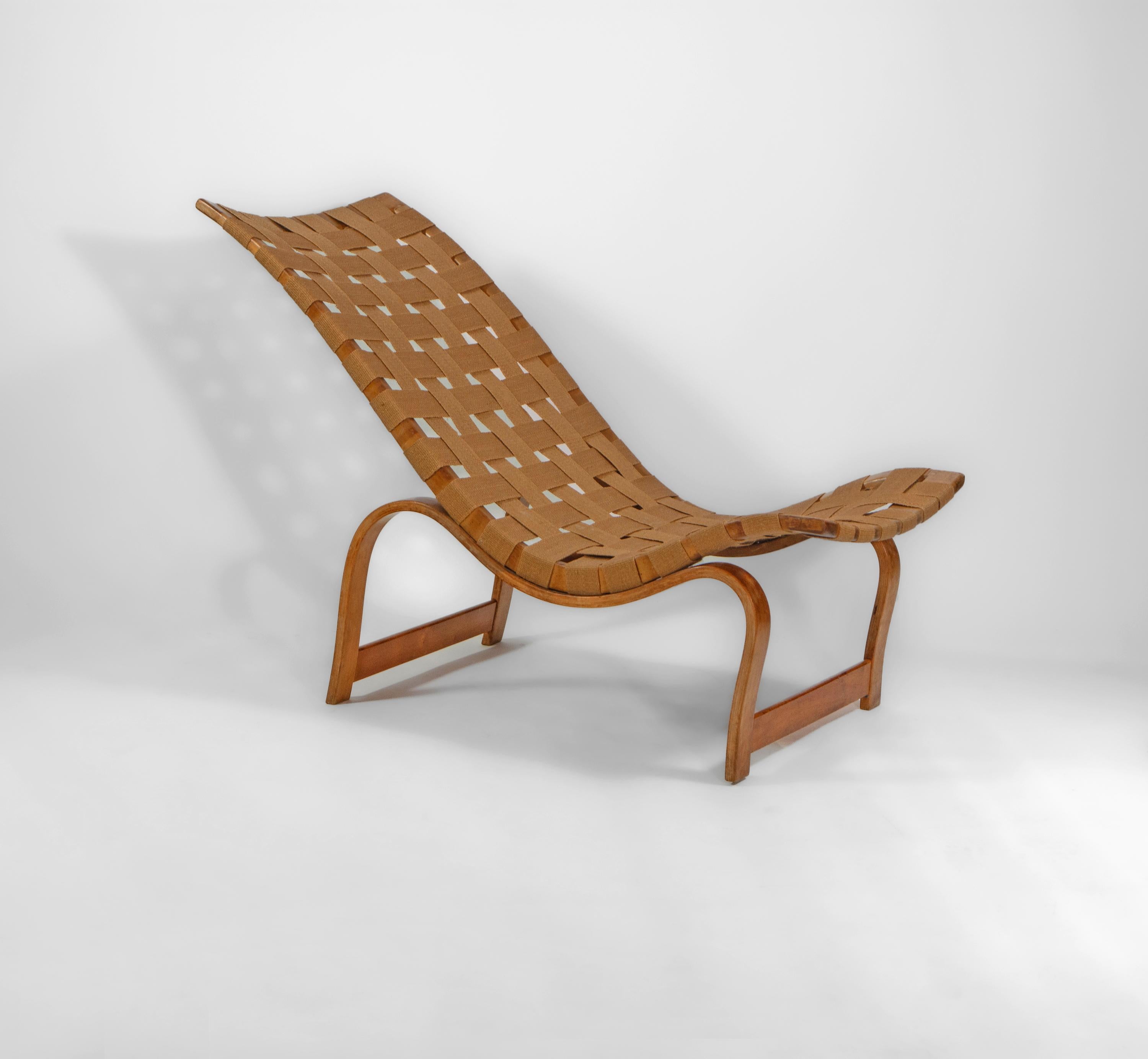 A rare easy 'resting' chair, model 36 by Swedish architect and designer Bruno Mathsson for Karl Mathsson. Circa 1940's. Labelled.

One of Bruno Mathsson's first concepts which was designed in 1936, and manufactured from around 1939. This model dates