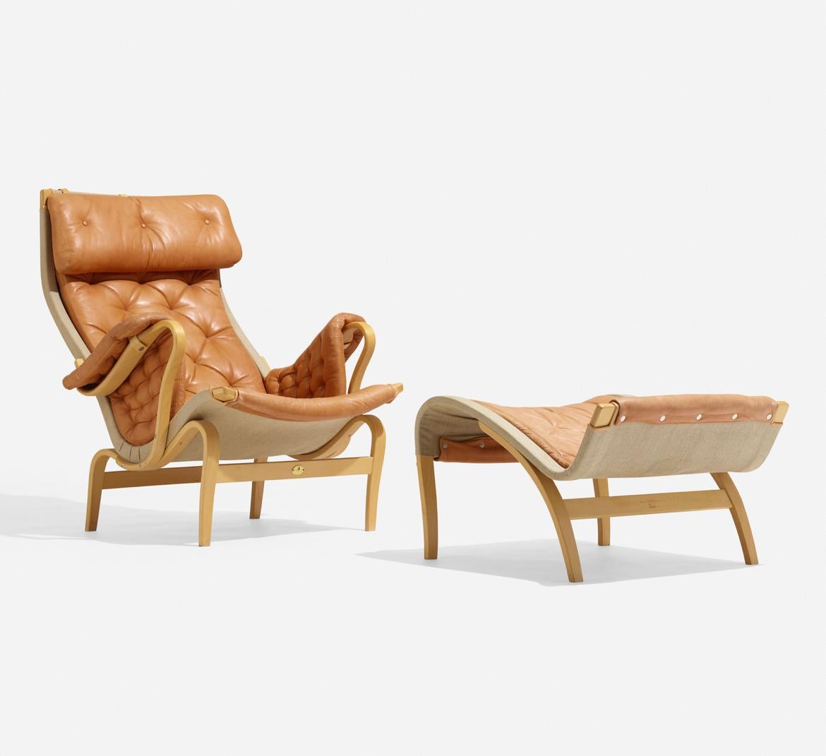 Bruno Mathsson Pernilla 69 lounge chair and ottoman. DUX, Sweden, 1969. Leather, beech plywood, canvas.
Chair measures: 38¼ h × 35 w × 37 d in (97 × 89 × 94 cm)
Ottoman measures: 16 h × 24½ w × 28 d in (41 × 62 × 71 cm)