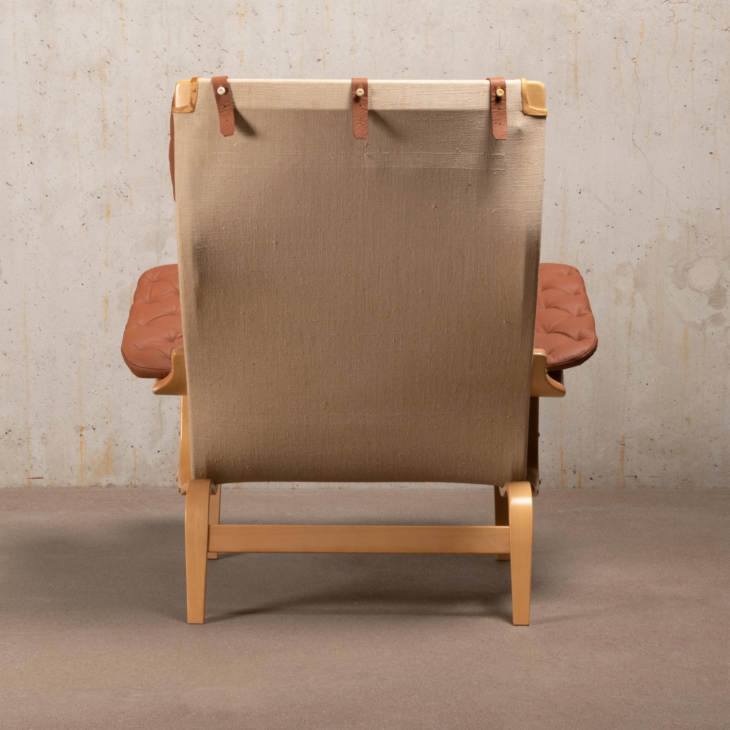 Bruno Mathsson Pernilla Easy Chair and Ottoman in Beech Wood and Brown Leather In Good Condition In Amsterdam, NL