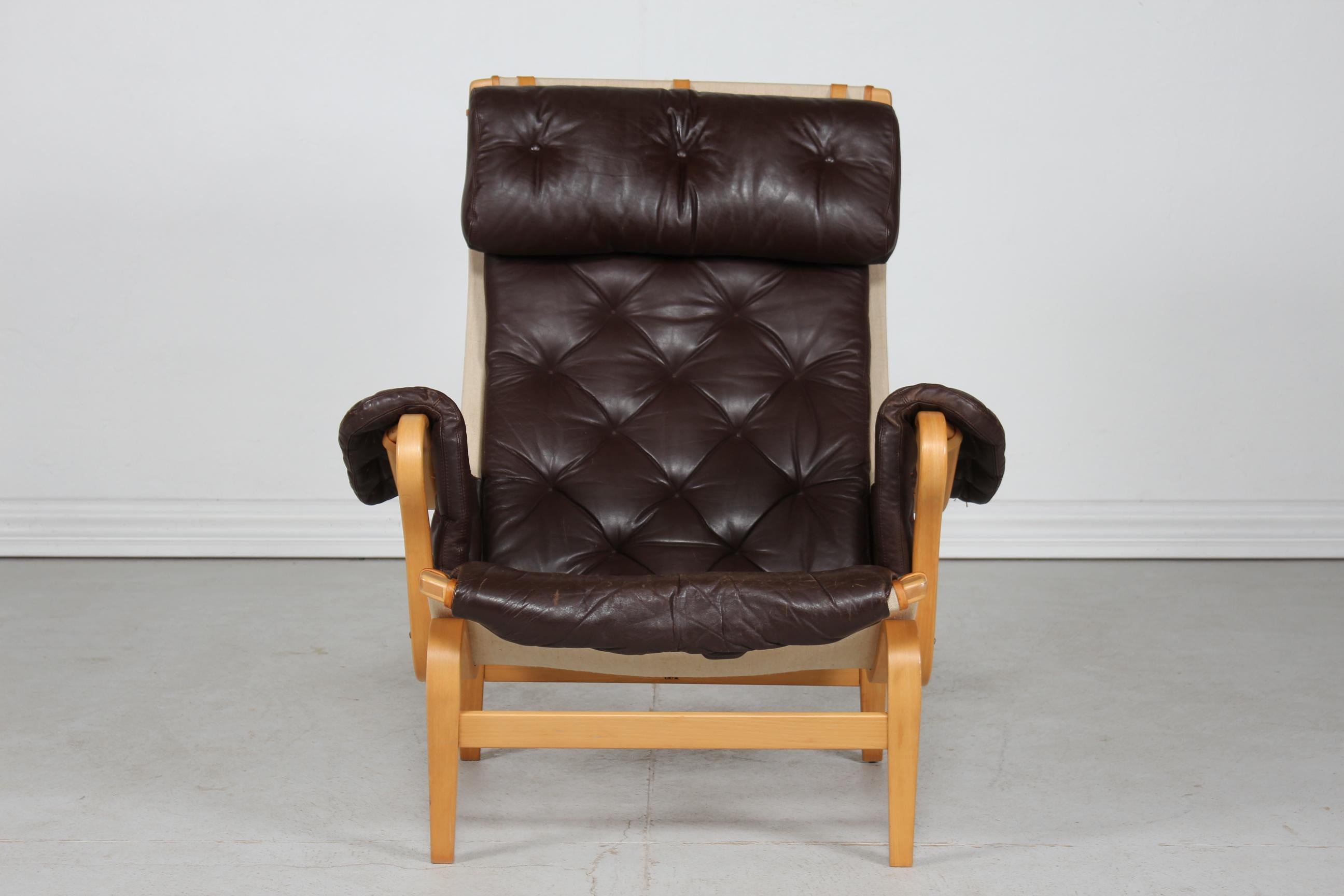 Swedish Bruno Mathsson Pernilla Lounge Chair for Dux. Mocha Colored Leather Sweden 1970s For Sale