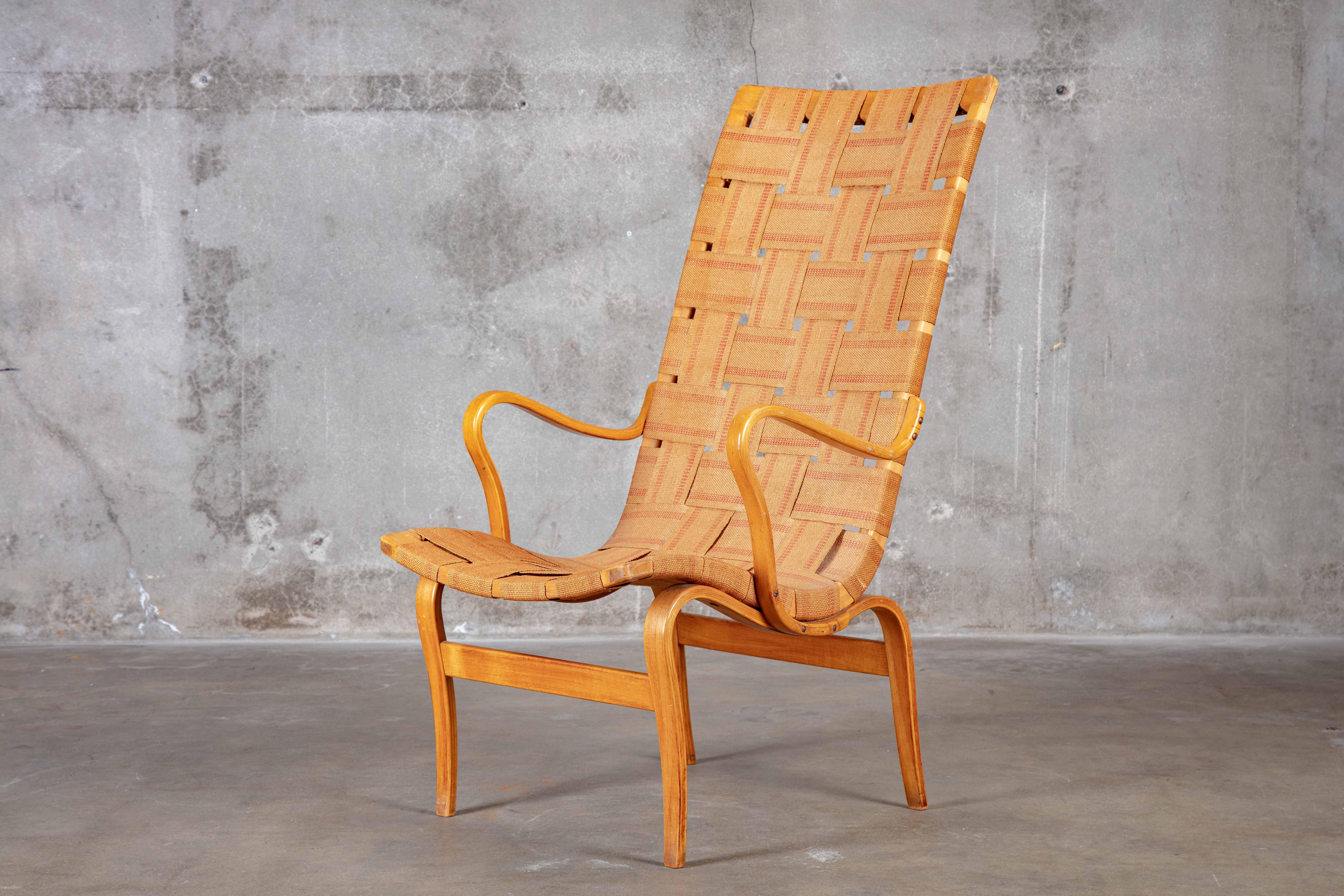 Bruno Mathsson (Swedish 1907-1988) Pernilla highback lounge chair produced by Karl Mathsson.

Measures: Seat height 17 inches

Arm height 24.5 inches.
