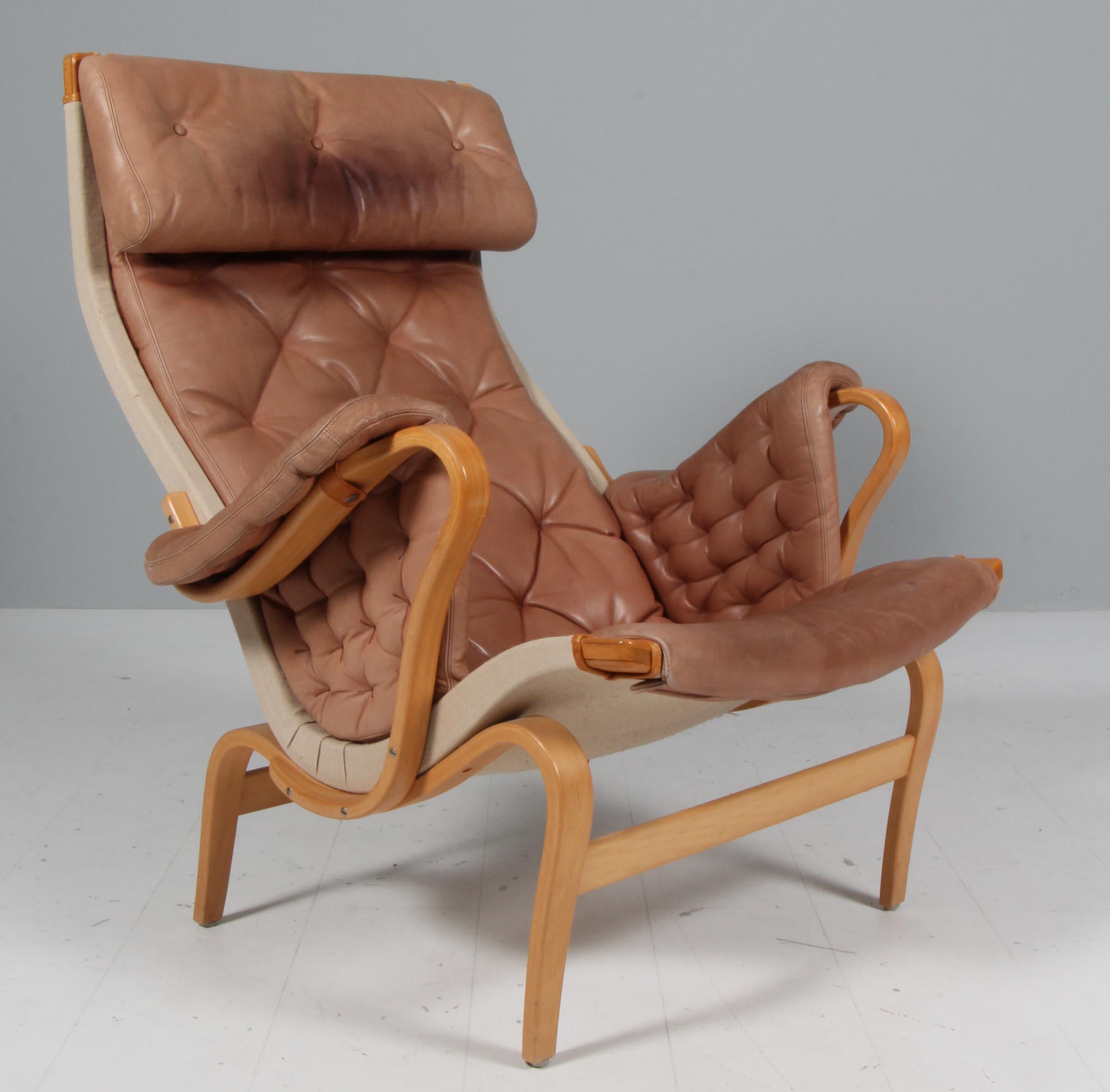 Late 20th Century Bruno Mathsson Pernilla Lounge Chair with Ottoman, in patinated leather For Sale