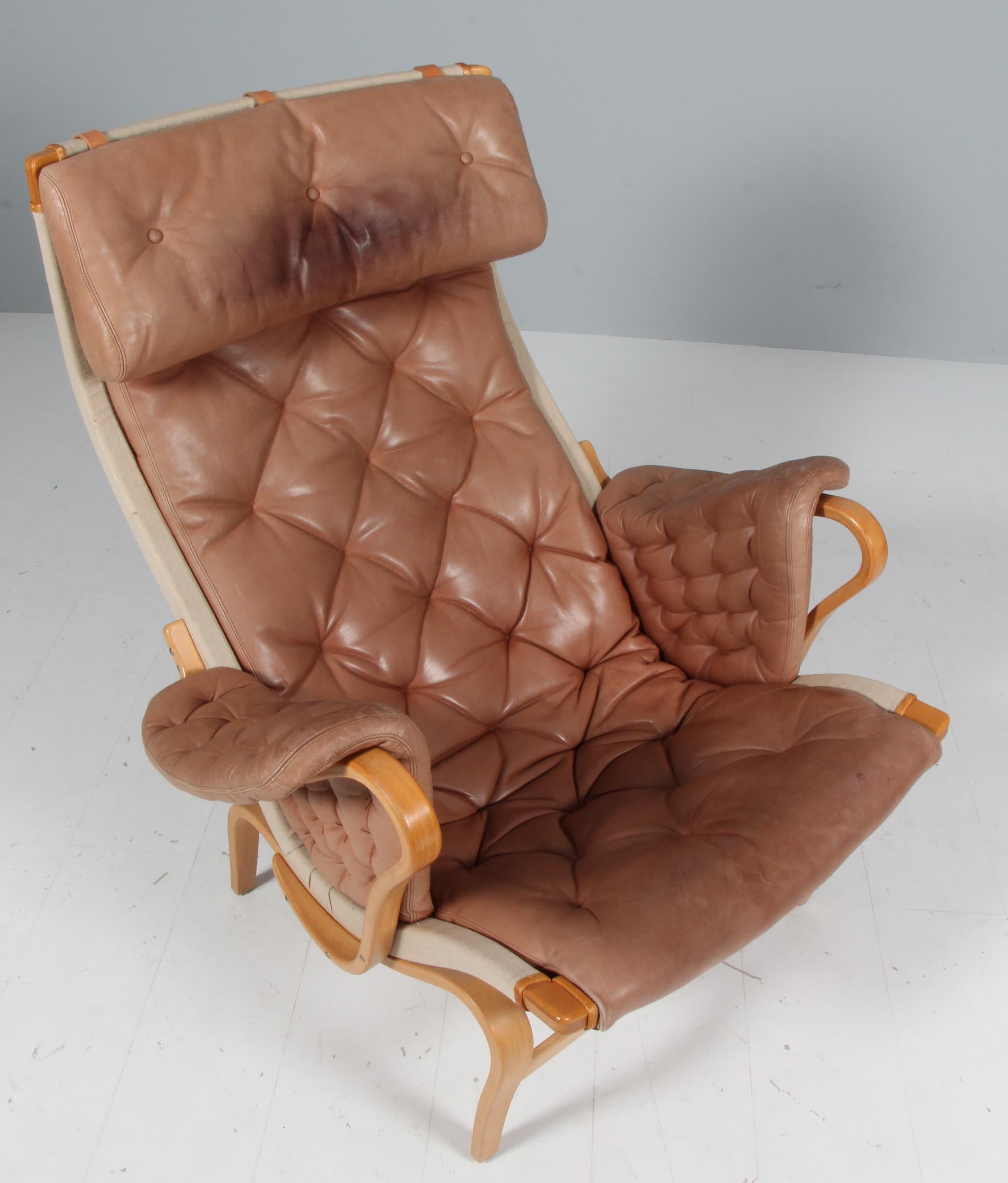 Leather Bruno Mathsson Pernilla Lounge Chair with Ottoman, in patinated leather For Sale