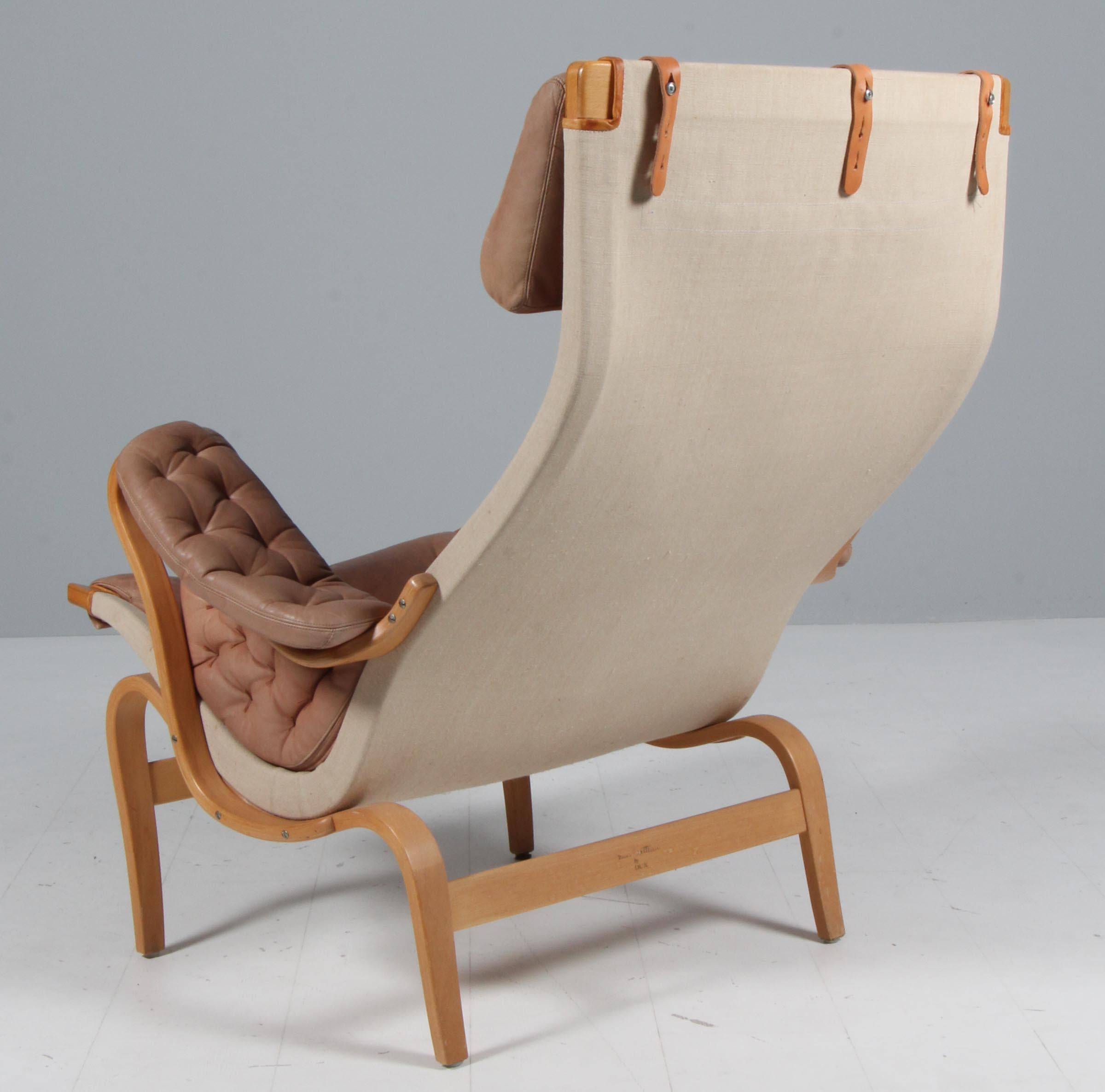 Bruno Mathsson Pernilla Lounge Chair with Ottoman, in patinated leather For Sale 1