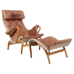 Bruno Mathsson Pernilla Lounge Chair with Ottoman, in patinated leather