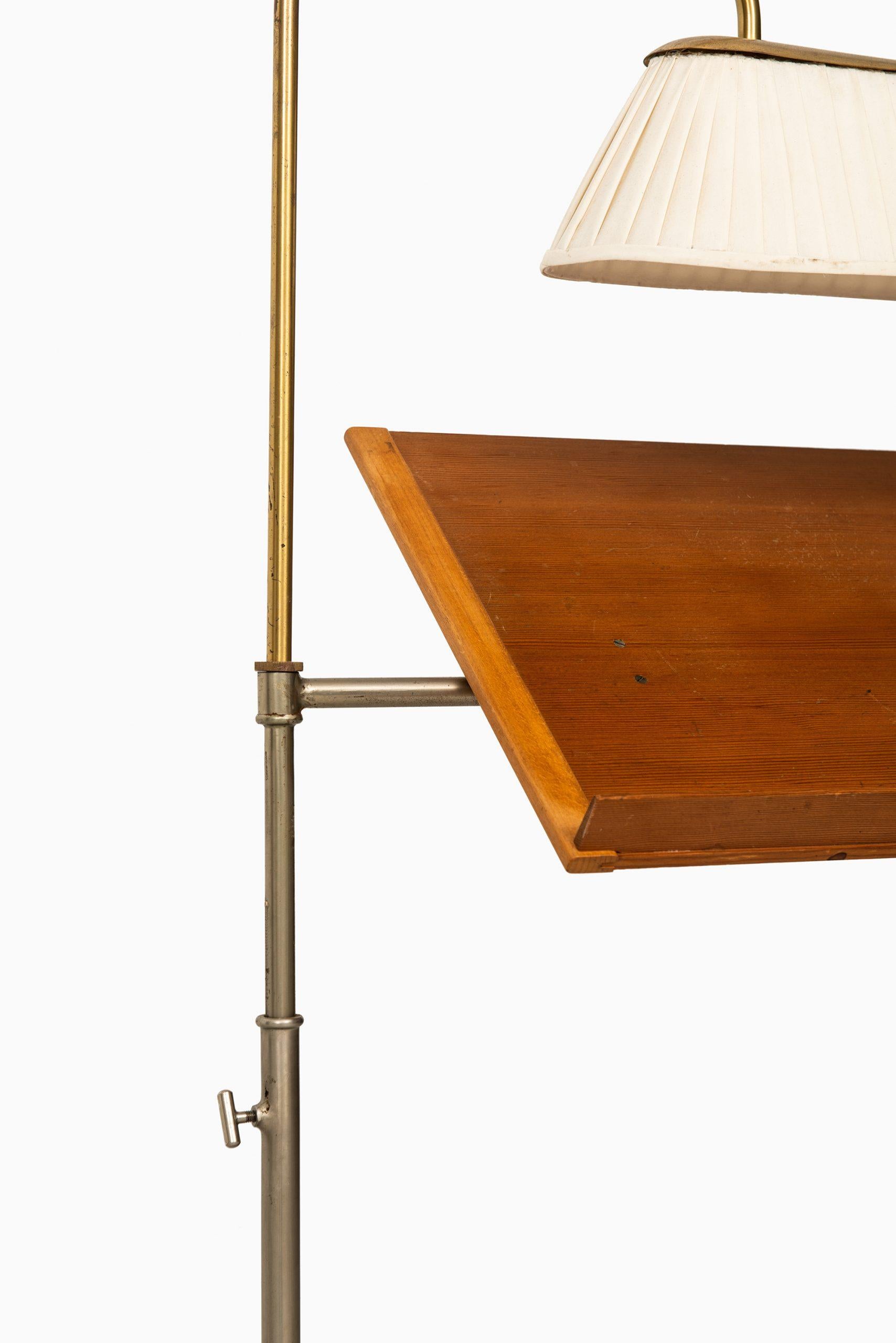 Very rare reading stand with light designed by Bruno Mathsson. Produced by Karl Mathsson in Värnamo, Sweden.
   