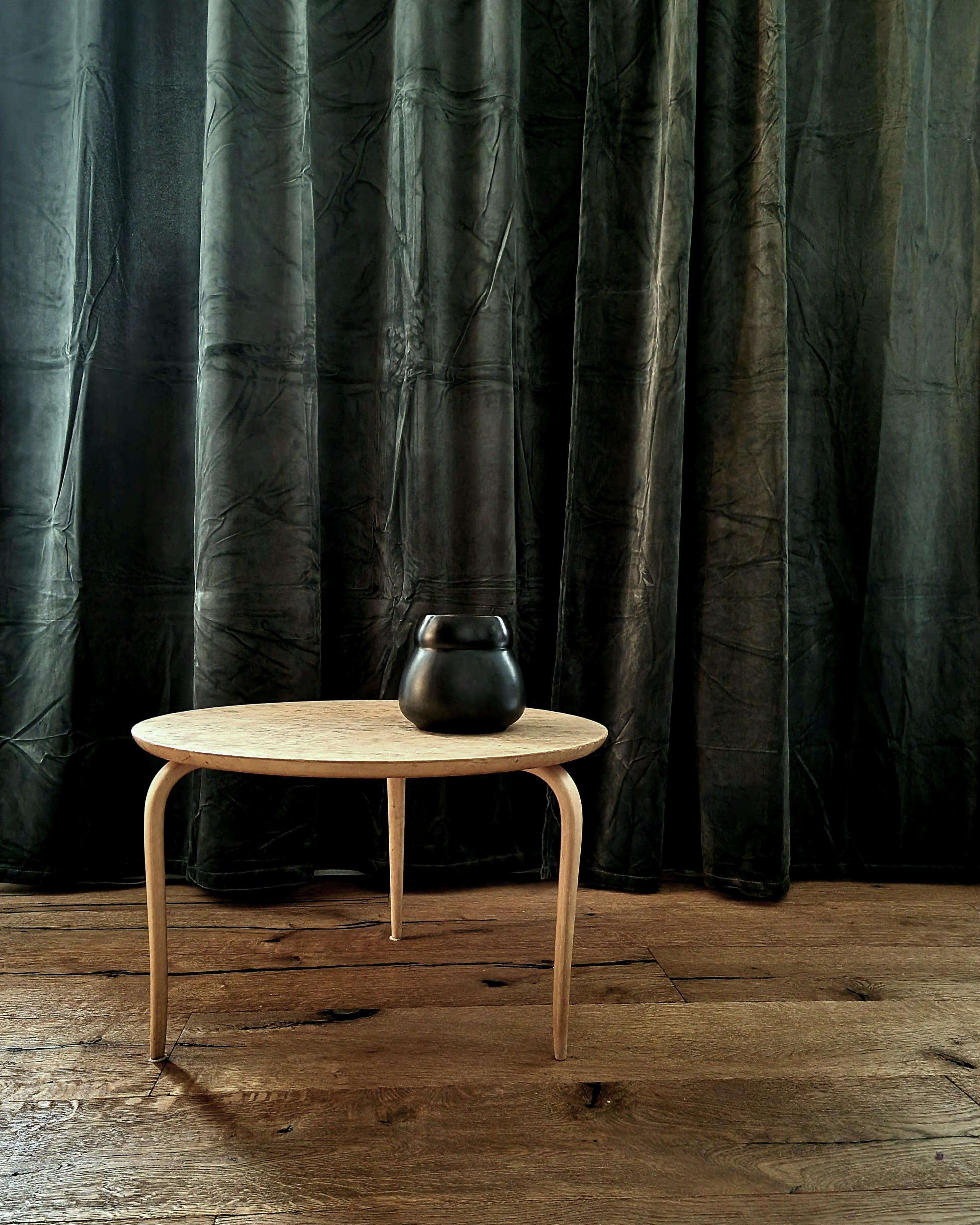 Occasional table in Karelian and flame birch. Designed by Bruno Mathsson in 1936 for his fathers furniture company Firma Karl Mathsson. 

This table is dated 1974. 

      