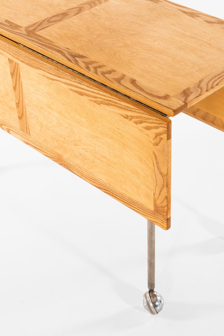 Rare side table designed by Bruno Mathsson. Produced by Karl Mathsson in Värnamo, Sweden.