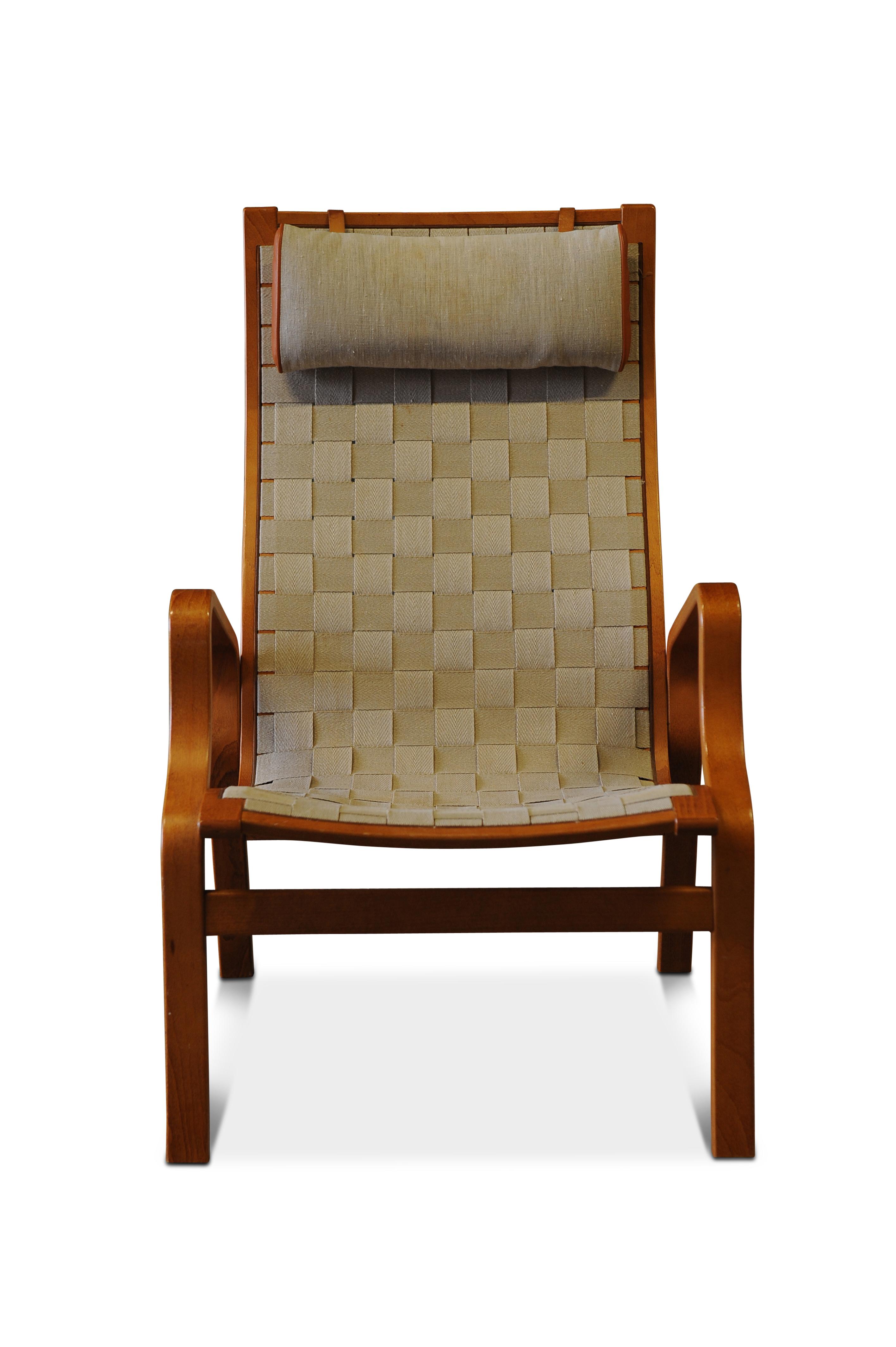 Bruno Mathsson style chair with cream woven strap upholstery & beech bentwood frame.

Stamped to underneath of frame.
     
   