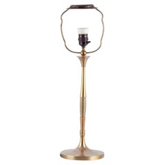 Bruno Paul, German architect. Tall Art Deco table lamp in polished brass