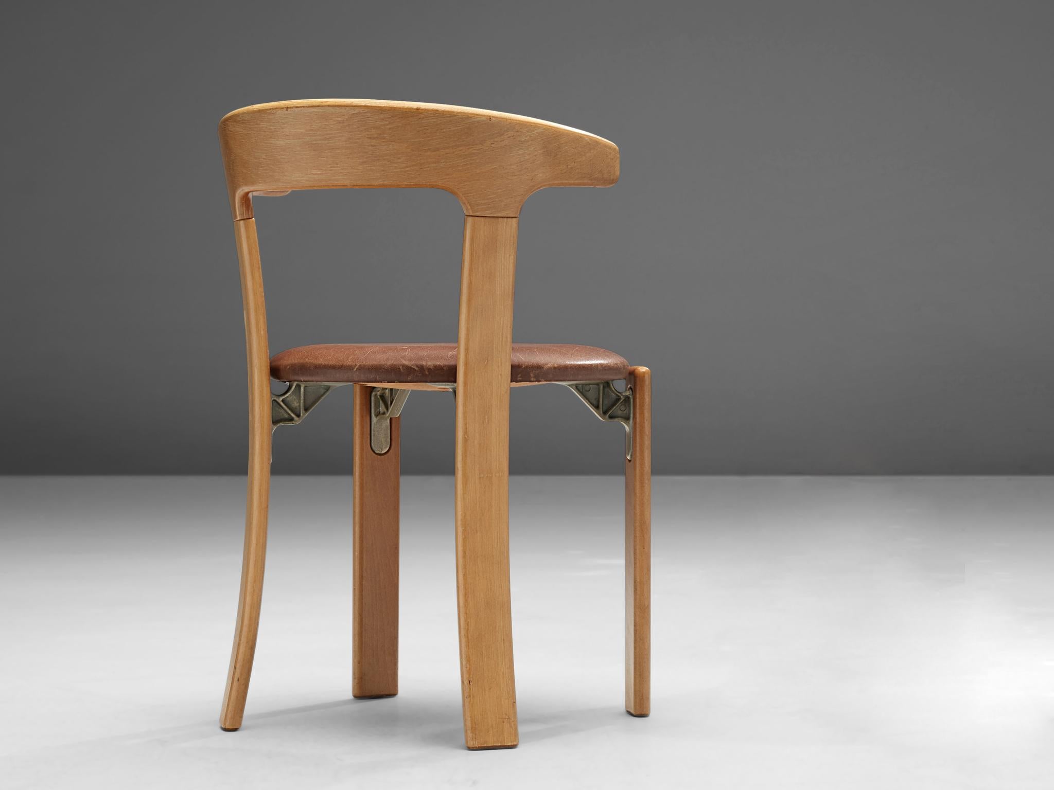 Bruno Rey for Kush & Co, chair, leather and beech, Switzerland, 1971.

This chair is designed by Bruno Rey in Switzerland in 1971 and is very comfortable. The beech backrest and legs have rounded edges. Besides, the backrest has a sculptural