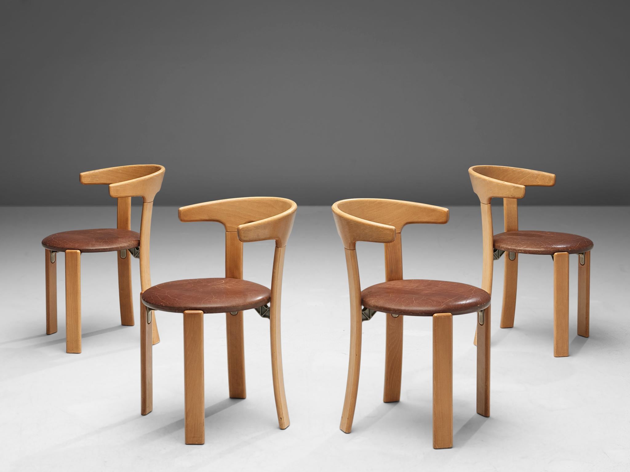 Bruno Rey for Kush & Co, set of five dining chairs, leather and beech, Switzerland, 1971.

This set of dining chairs is designed by Bruno Rey in Switzerland in 1971 and is very comfortable. The chairs are also stackable and were produced in Germany