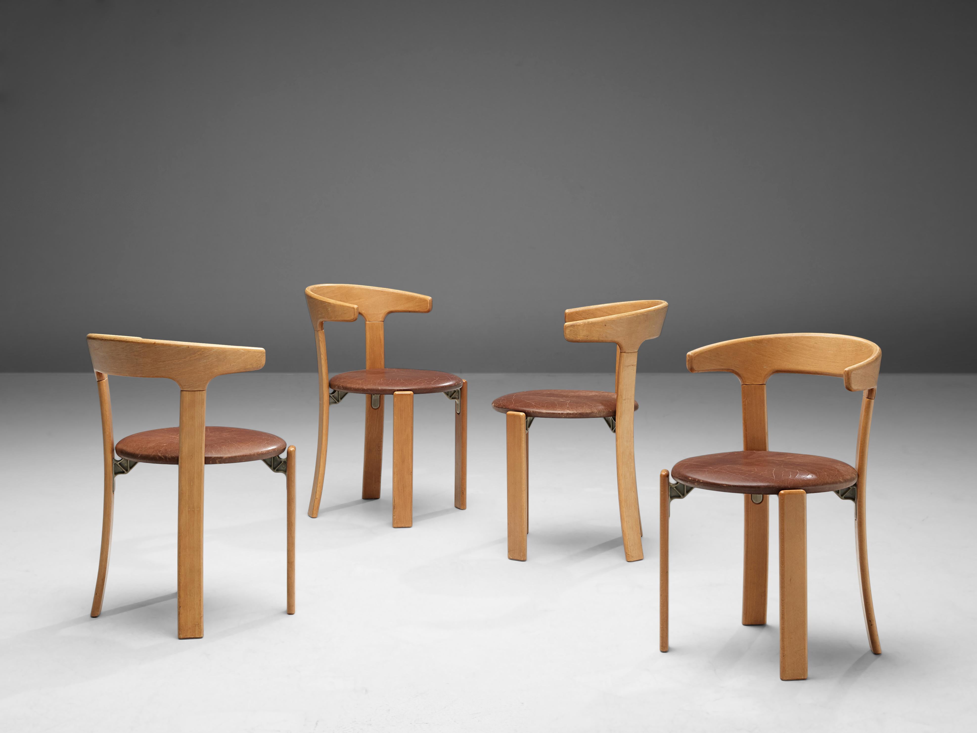 Bruno Rey for Kush & Co, set of five dining chairs, leather and beech, Switzerland, 1971.

This set of dining chairs is designed by Bruno Rey in Switzerland in 1971 and is very comfortable. The chairs are also stackable and were produced in