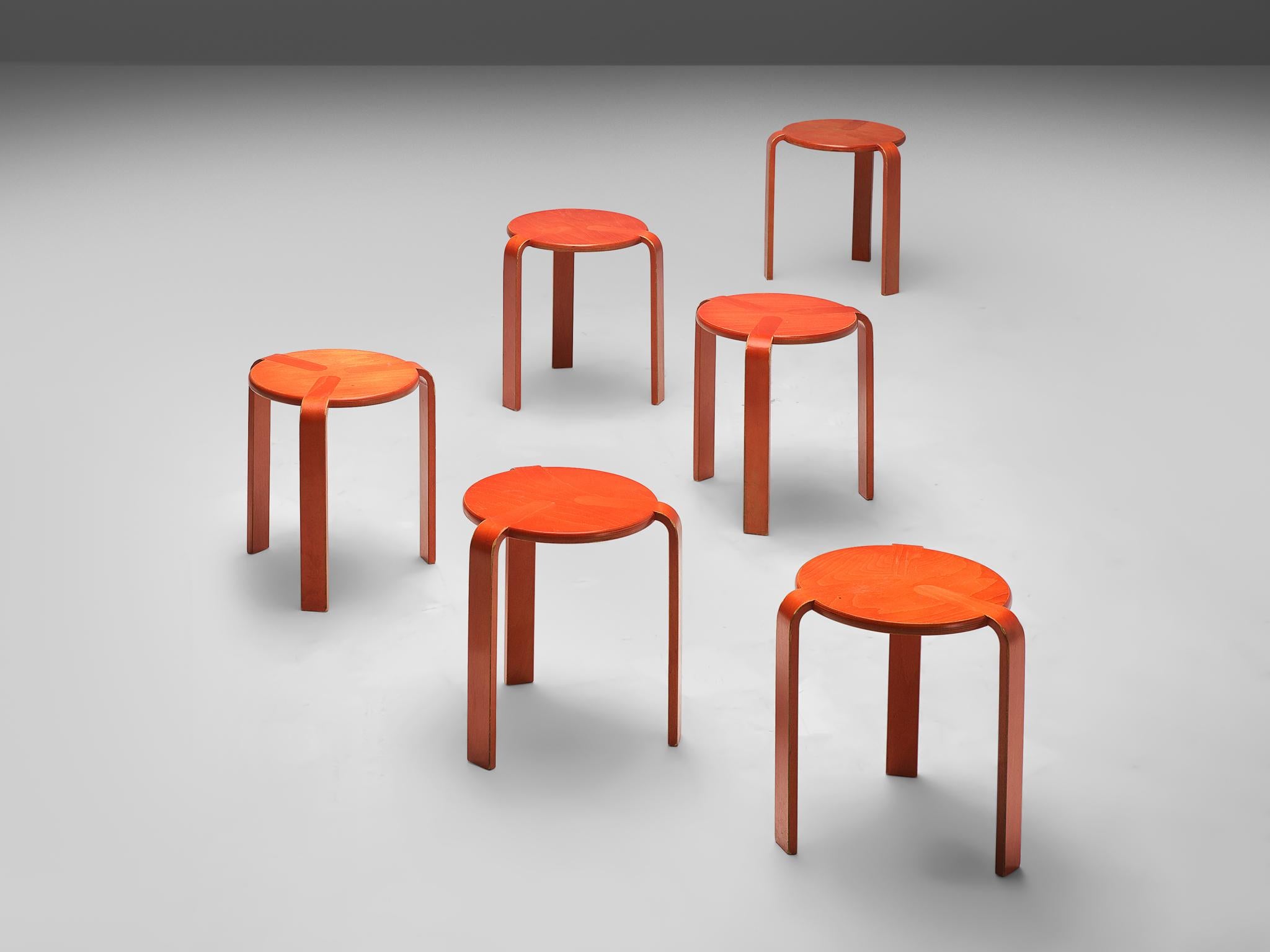 Bruno Rey for Dietiker, stools, plywood, Switzerland, 1970s 

These stools are made out of plywood. Three bent legs smoothly flow into the surface of the round seat. These stools are stackable and light, so they are very practical in use. The warm