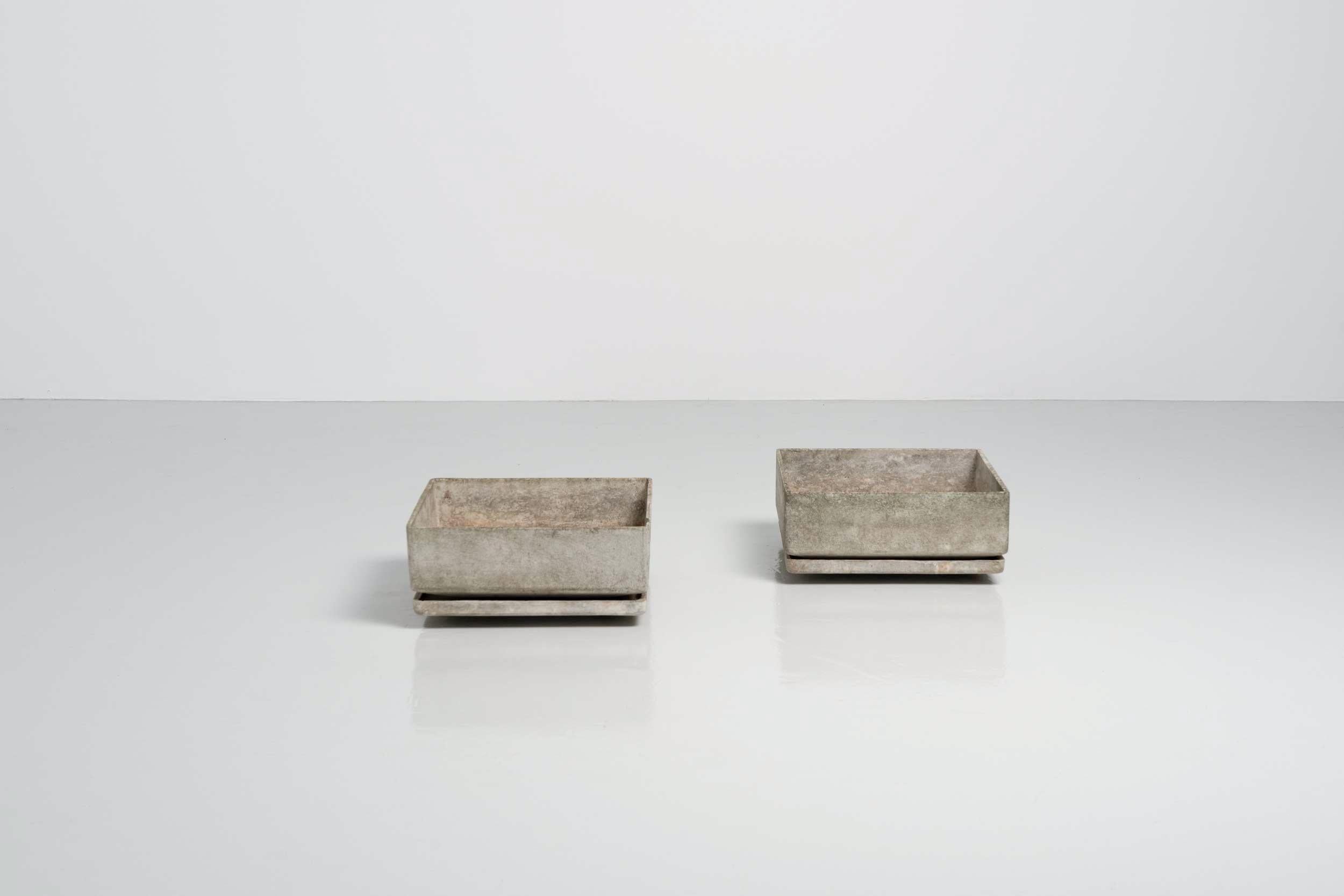 Very nice pair of square planters designed by Bruno Rey and manufactured by Eternit AG, Switzerland 1960. These square shaped planters have a bowl underneath which is very nice. These planters are made of cellulose infused fiber cement. They have a