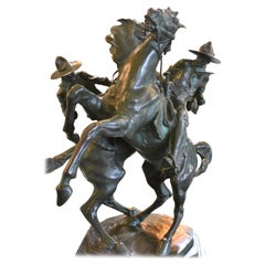 « Chevaux en cabriole », sculpture en bronze de Bruno Zach représentant des chevaux et cowboys, 1923, signée