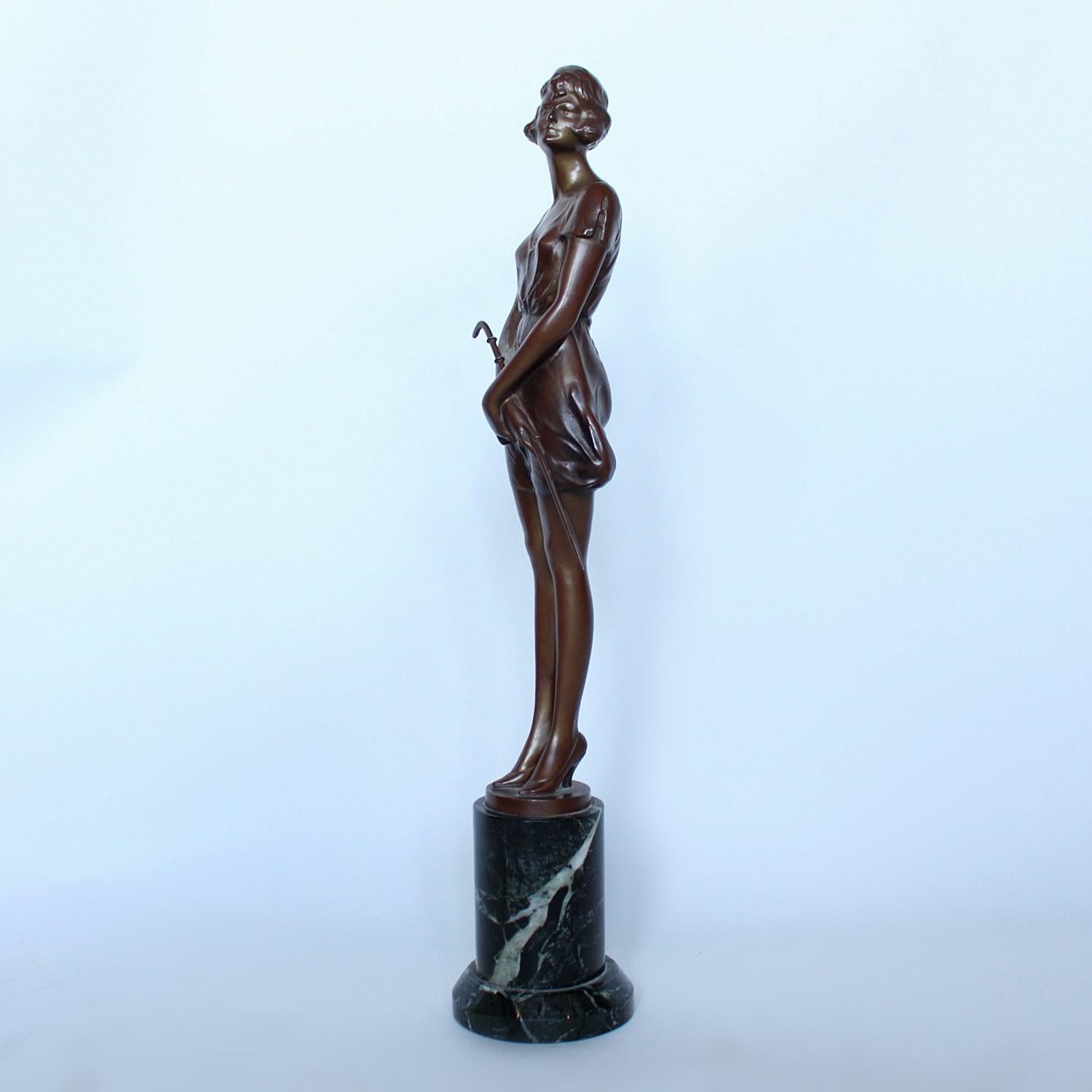 The Riding Crop, an Art Deco, patinated bronze figure of a scantily clad young lady in heels, holding a riding crop. Set over a marble base. Signed B Zach to cast. Stamped for Argentor-Werke foundry, Vienna.


 